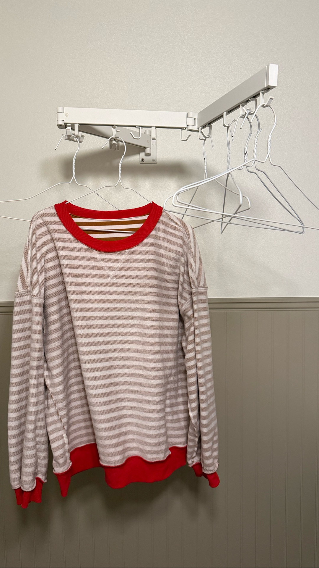 If you need a drying rack for your shirts, sweaters and sweatshirts this is it! I the best part is when you are done using it, it folds back up and fits nicely behind an open door. #hacks #laundryroom #laundryroomhacks #dryingclothes #organized 

#LTKHome