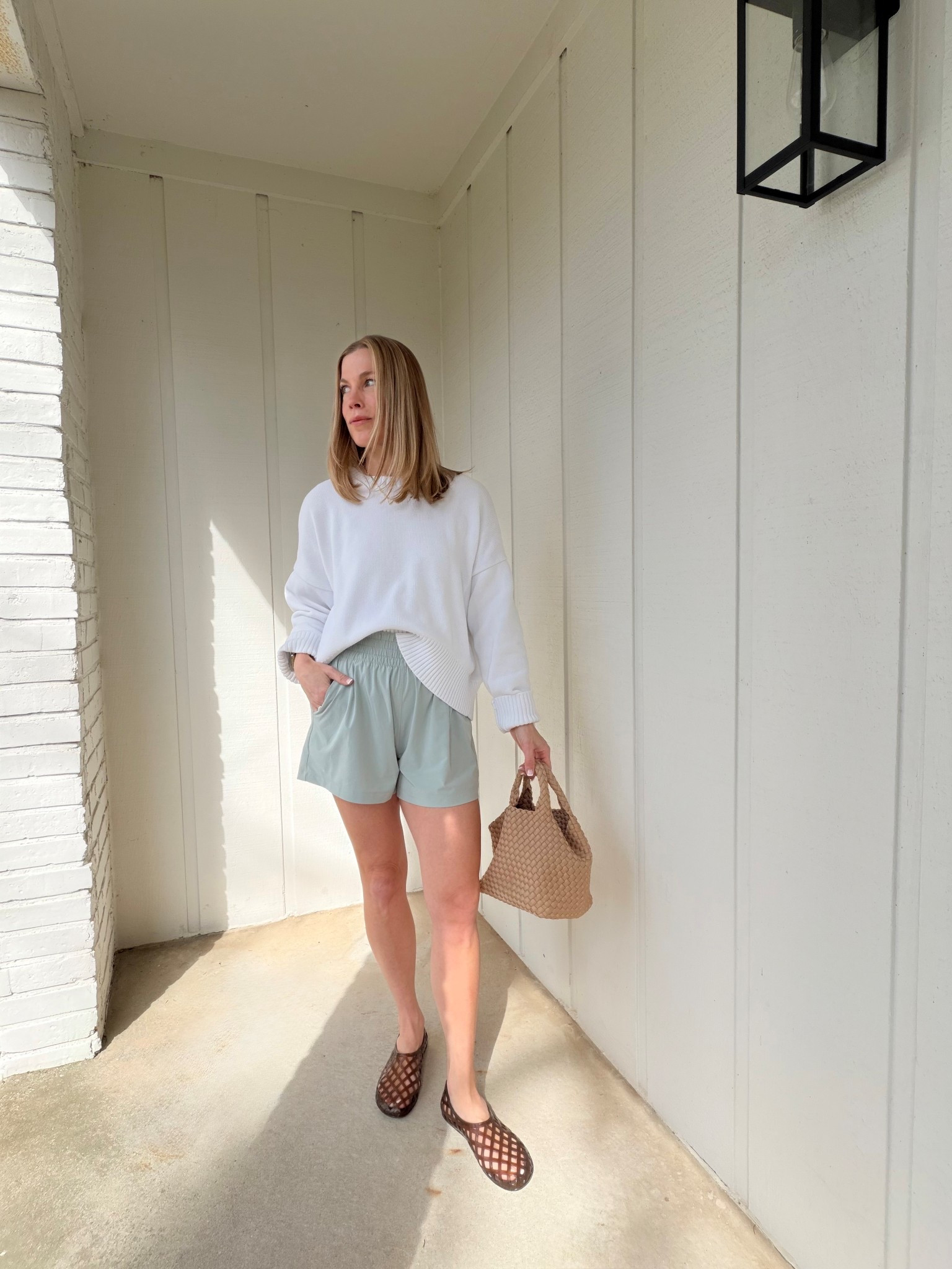 Quince cotton sweater. I sized up to a medium. Vuori Villa shorts. I’m wearing a small. Jelly shoes. Size up if between sizes. 

#jellies #momstyle #casualstyle

#LTKOver40 #LTKmomlife #LTKootd