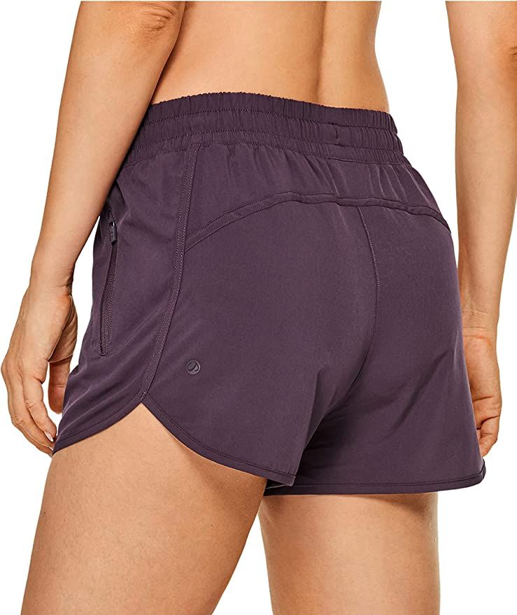 CRZ YOGA Women's Mid Rise Dolphin Running Shorts Mesh Liner 2.5'' - Quick Dry Summer Workout Athl... | Amazon (US)