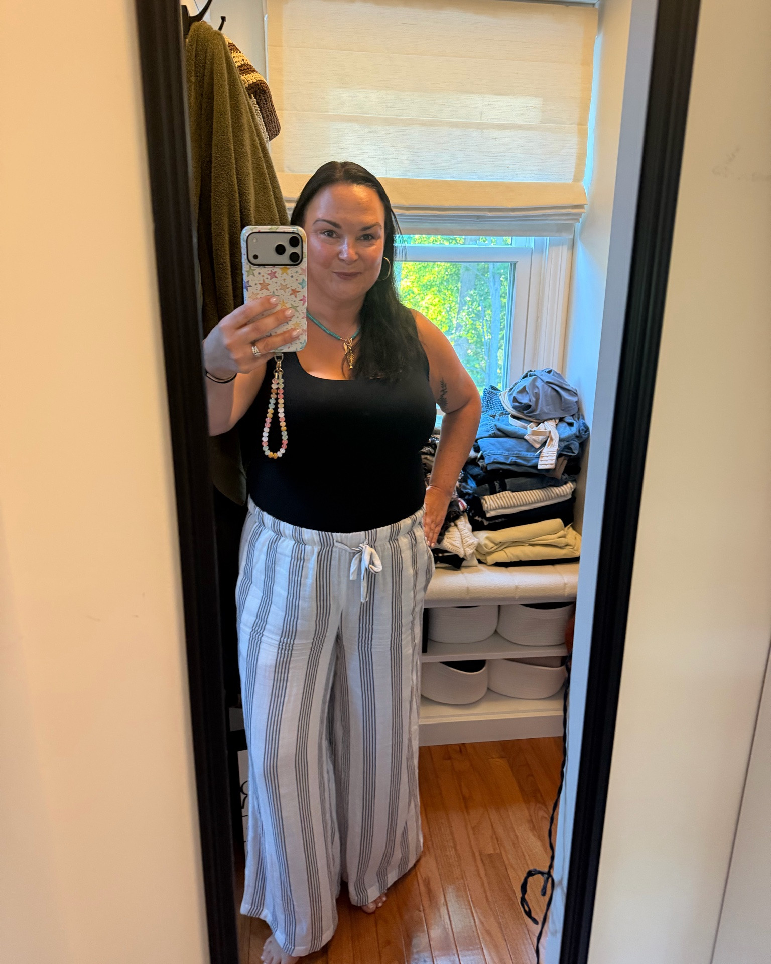 Easy summer outfit 🤍☀️ Wearing a black square-neck tank with striped linen drawstring pants, black sandals, and my favorite turquoise necklace. Everything is linked here on LTK!

#LTKootd #LTKMidsize #LTKSeasonal