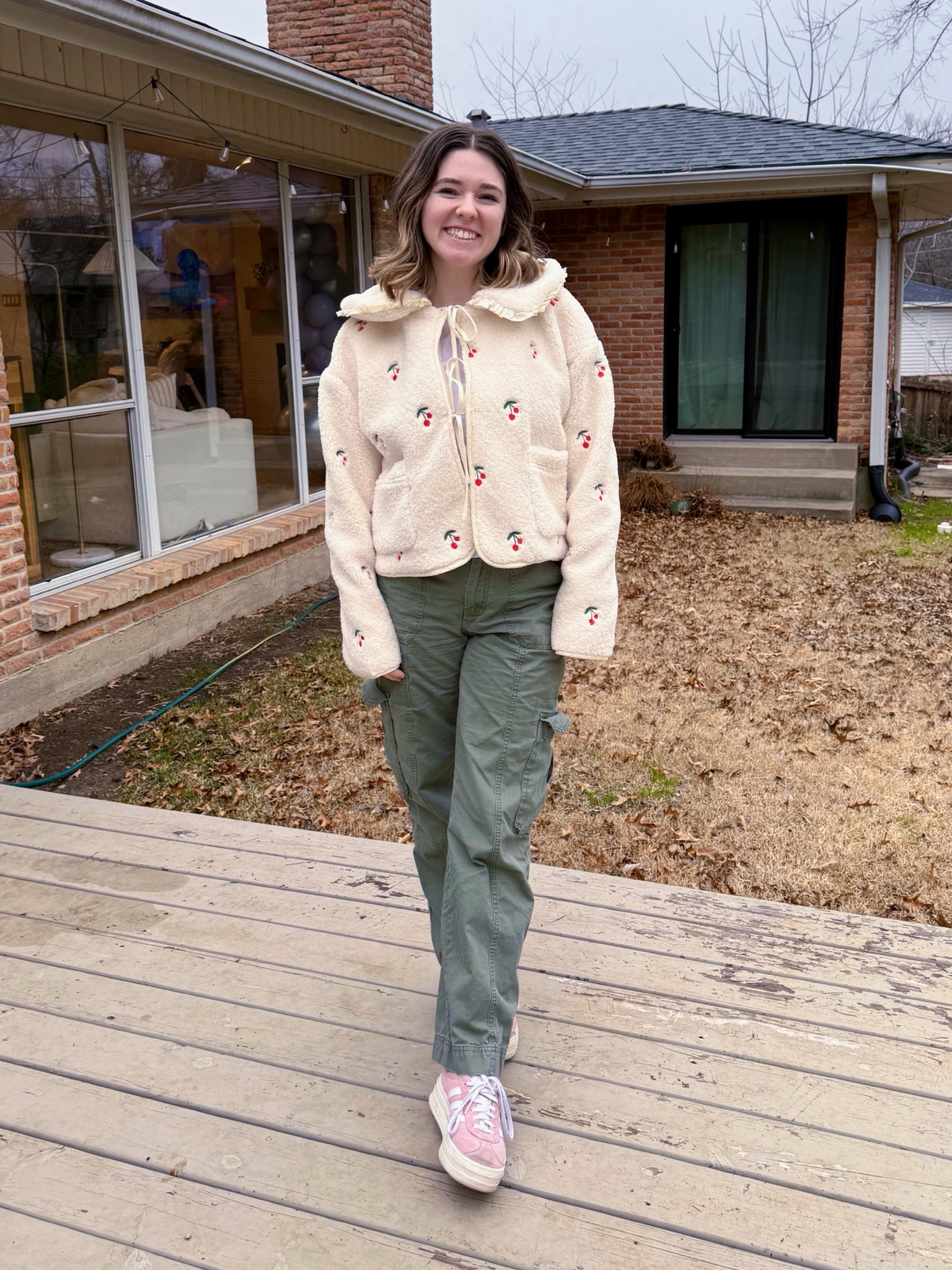 Everyday outfit 
Cherry Anthropologie jacket
Abercrombie cargo pants 
Abercrombie white tee 
Pink adidas gazelles 

#LTKStyleTip #LTKShoeCrush