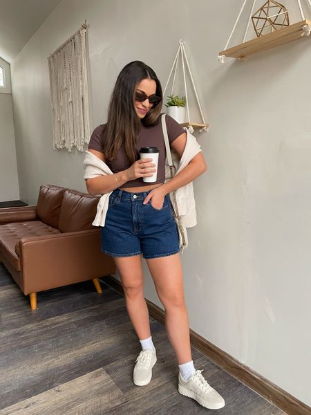 Spring transition outfit 🤎

Baby tee, nuuds, Abercrombie denim, Abercrombie shorts, high rise dad short, high waisted shorts, cardigan, dolce vita sneakers, lifestyle shoes, neutral sneakers

#LTKstyletip #LTKSeasonal #LTKfindsunder50