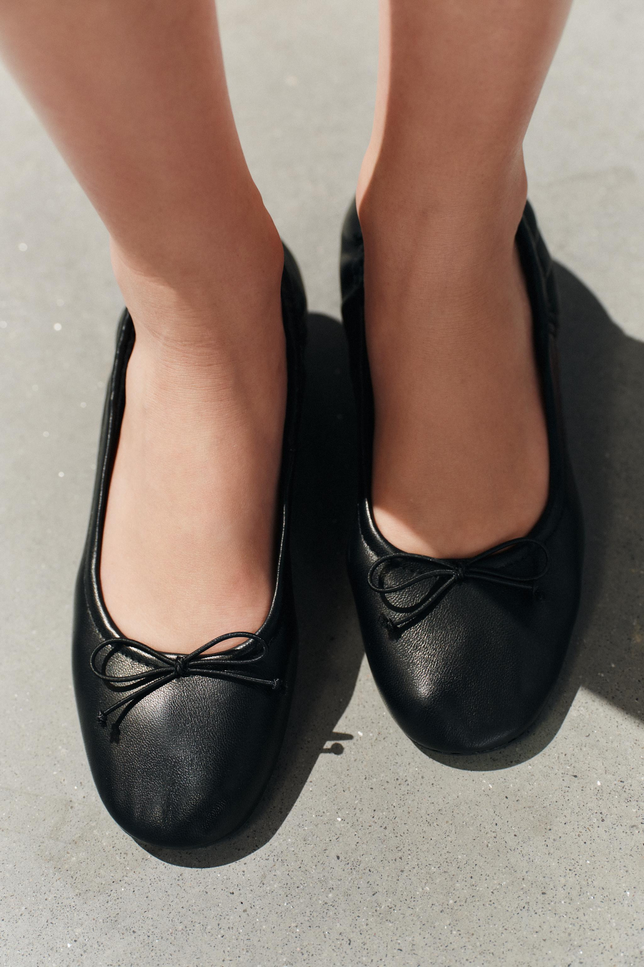 Leather ballet flats with heels. Featuring a bow detail and gathered texture on the front. Round ... | Zara US