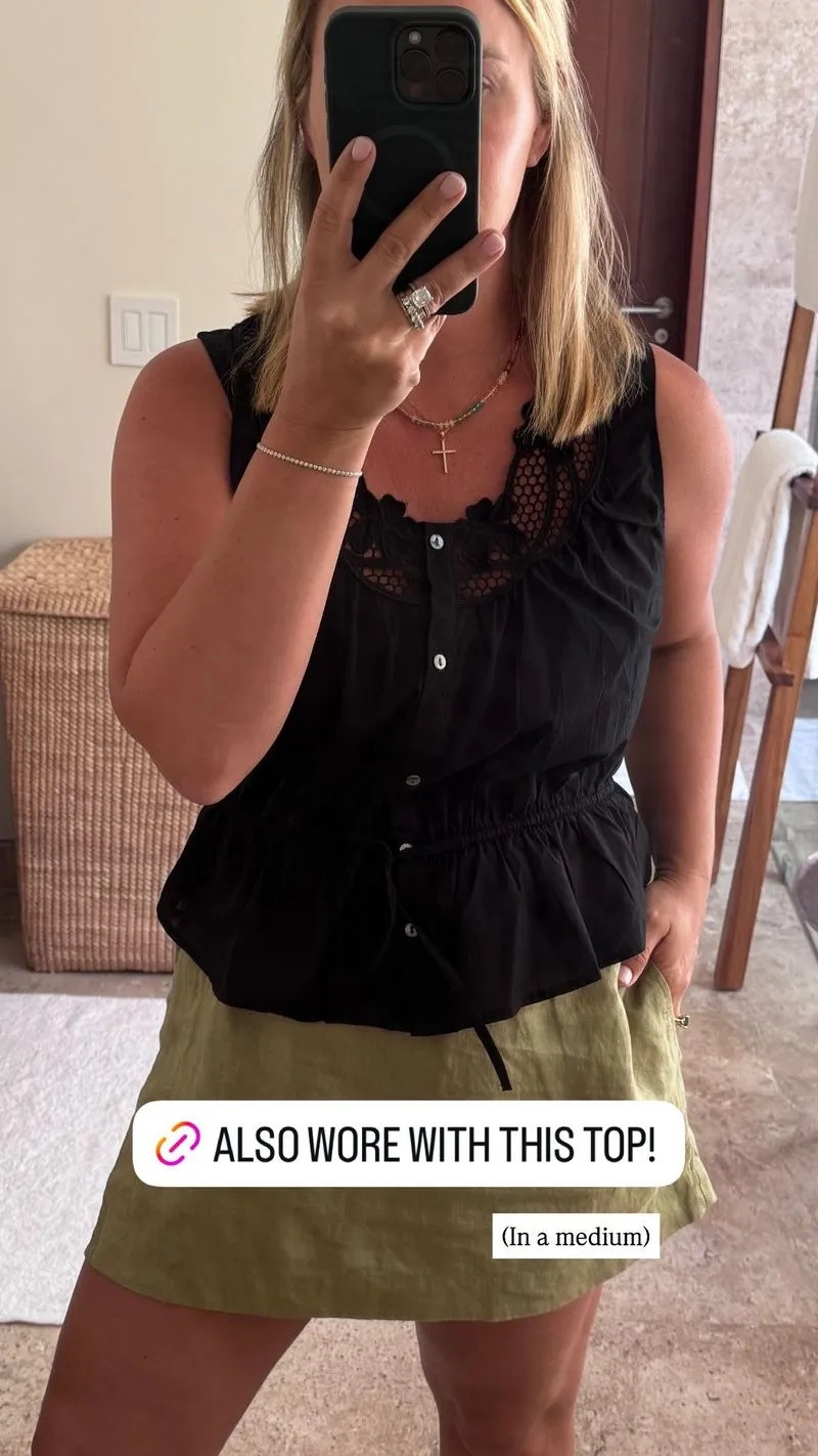 Vacation Outfit - Black top and Green skort 

 #LTKSeasonal