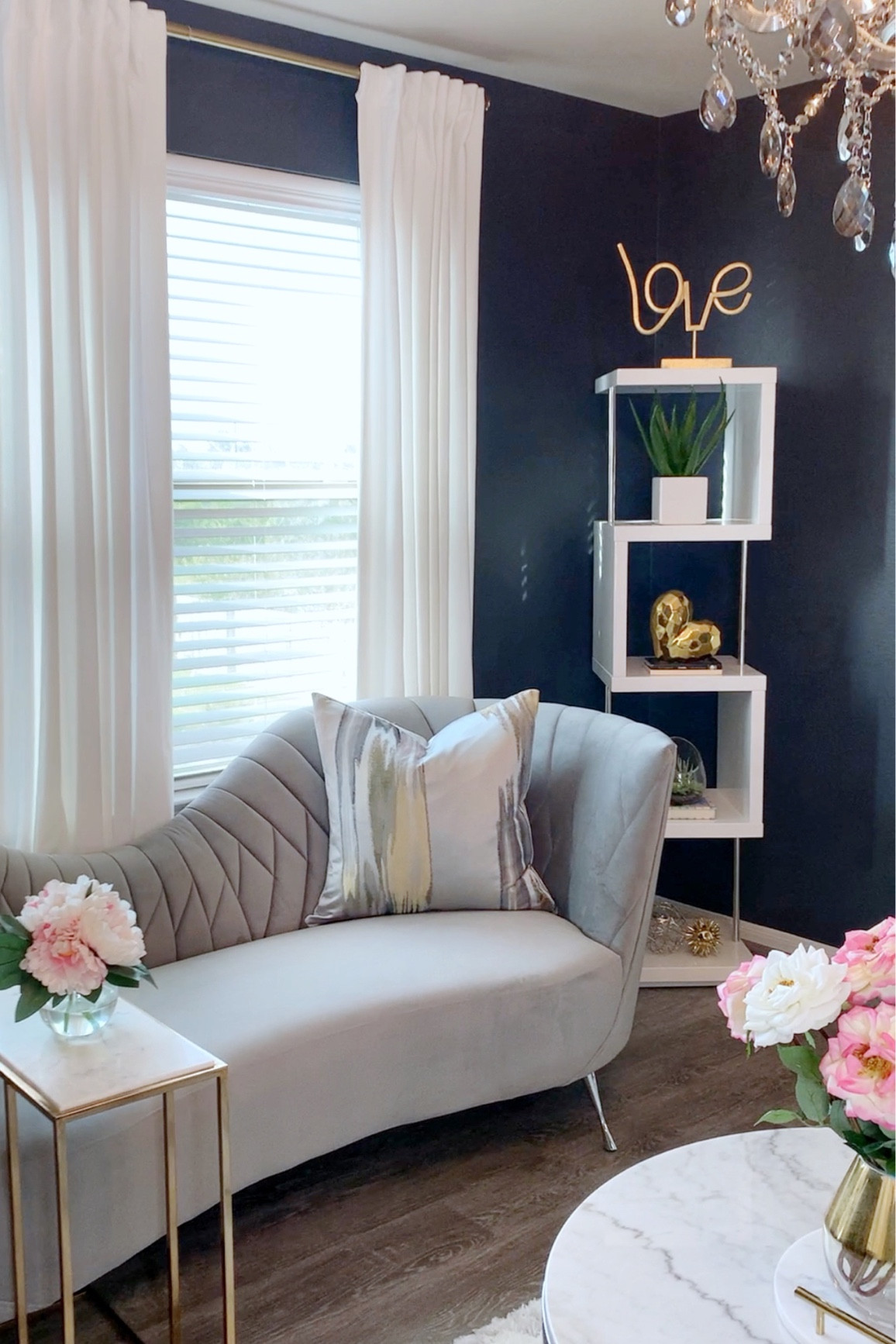 Have a sitting room of small living room? Here’s an idea for you #homedecor #springdecor #couches #sofas #coffeetable #bookshelf #chandelier #summerdecor 

#LTKsalealert #LTKFind #LTKhome