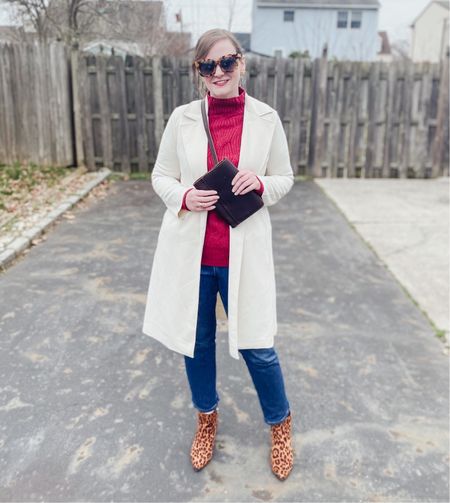 Red cable knit sweater 
Leopard ankle boots
Straight leg jeans
White coatigan 
Gold bow earrings 
Gold hair clips

#LTKshoecrush #LTKfindsunder100 #LTKstyletip