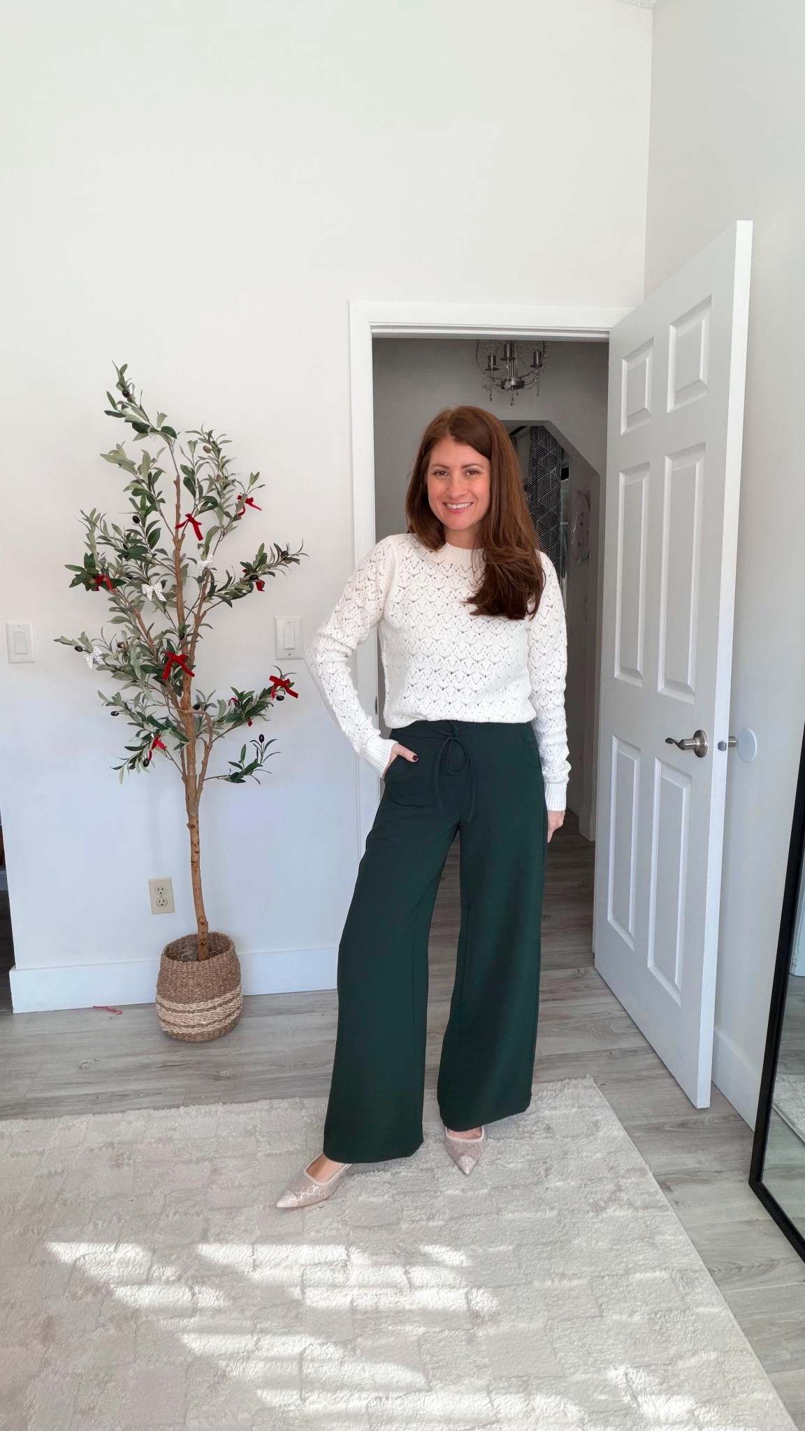 I am so surprised by how much I am loving these wide leg green pants from Target! They are super cute and I love the length of them. I paired them with this adorable sweater (on sale for $22) and these embellished heels. I did a size small in the sweater and XS in the pants, but think a small would be been better. 
Affordable winter outfit

#LTKSeasonal #LTKFindsUnder50 #LTKOver40