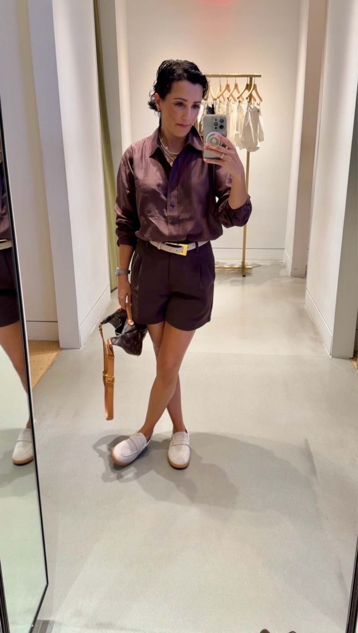 Chocolate brown is such a good way to start shifting into fall while it’s still warm out. I love the tonal button-down and tailored shorts together, especially styled with cream loafers and a contrasting belt. This was perfect for a day spent styling a personal client!

Top: XS
Bottoms: Size 2
Belt: XS

chocolate brown outfit, brown shorts outfit, button down shirt outfit, tailored shorts women, fall transition outfit, early fall fashion, cream loafers women, monochromatic outfit ideas, women over 40 style, elevated casual outfit, fall color trends, stylewitheugenia

#LTKOver40 #LTKSeasonal #LTKootd
