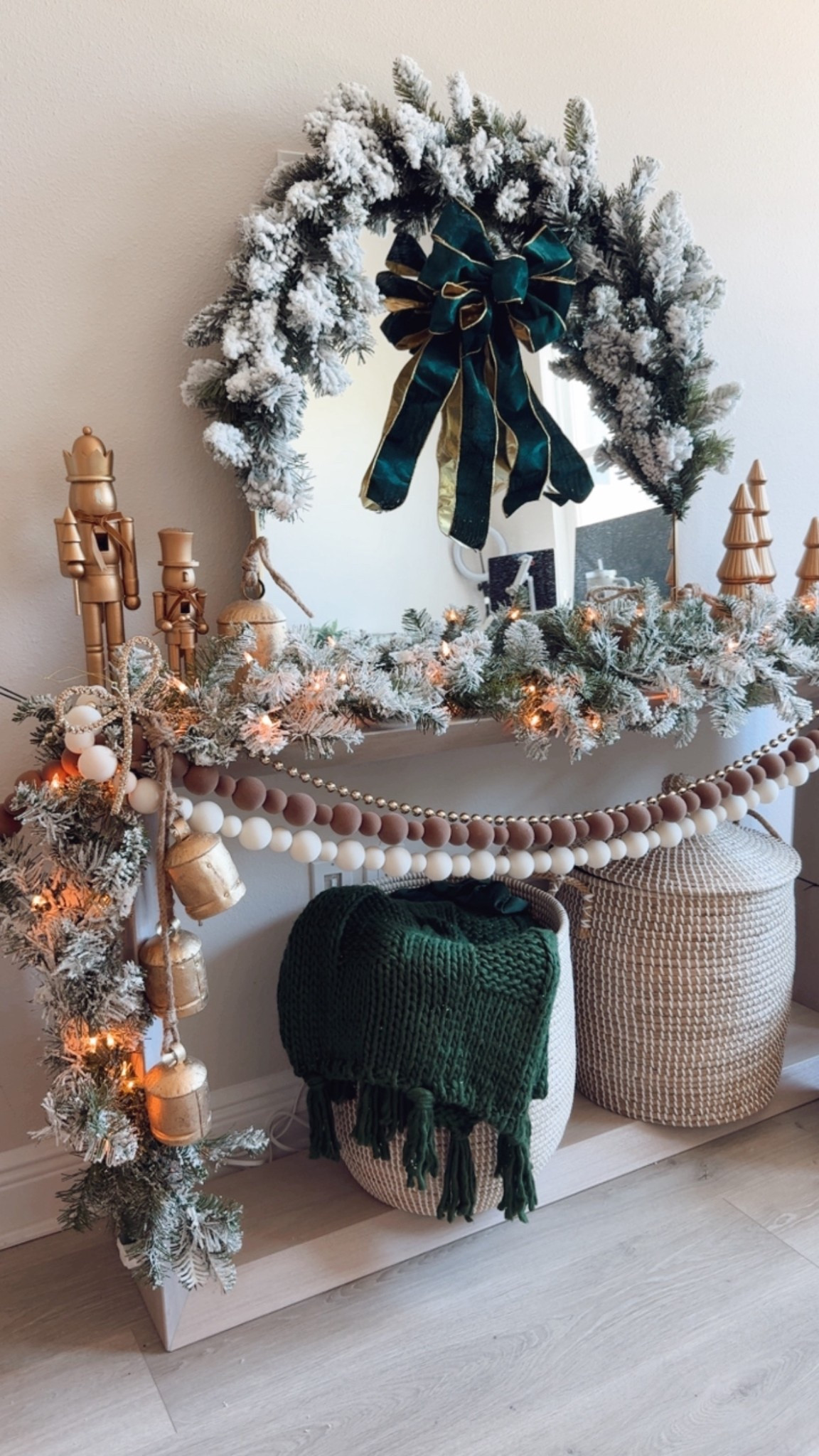 Console table / entryway table decorated for Christmas! 

I used flocked garland, a gold mirror, strung cow bells, gold jingle bells,  antique gold trees, reindeer figurines, etc to decorate the console table. The baskets were perfect for storing our green Christmas throw blankets. 

Christmas tree decor,
Christmas decorations, Ralph Lauren Christmas, vintage Christmas tree, Christmas console table, Christmas living room, Christmas family room

#LTKHome #LTKHoliday #LTKSeasonal