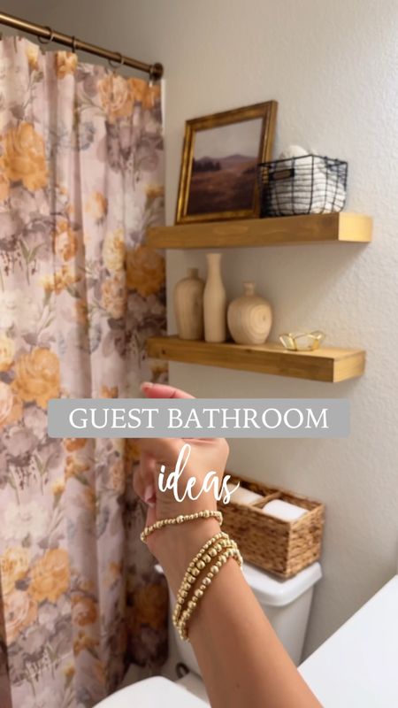 GUEST BATHROOM IDEAS 🛁

when one thing leads to another 🙃 before you know it, an entire lil bathroom refresh is happening! Getting this small bathroom ready for my sister and dad who will be visiting soon!

details here:
+ beautiful shower curtain that adds so much interest, cozy, and color in here 😌
+ little accent stool: Target find
+ towels: plush and the most gorgeous deep green color 
+ faux floral arrangement is from Amazon

Everything here will be linked in my bio and on my LTK 🫶🏼 what do you think of it? 

#bathroom #bathroomdecor #guestbathroom master bathroom, primary, home, interiors, shower, bath, shelf, shelf decor, styling, guest room, half bathroom, small bathroom, organic modern, modern rustic 

#LTKFindsUnder100 #LTKFindsUnder50 #LTKHome