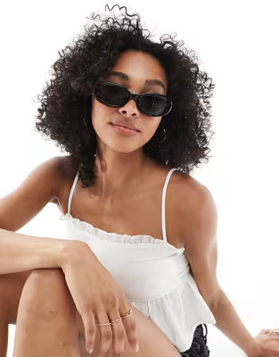 ASOS DESIGN oval sunglasses in shiny black | ASOS (Global)