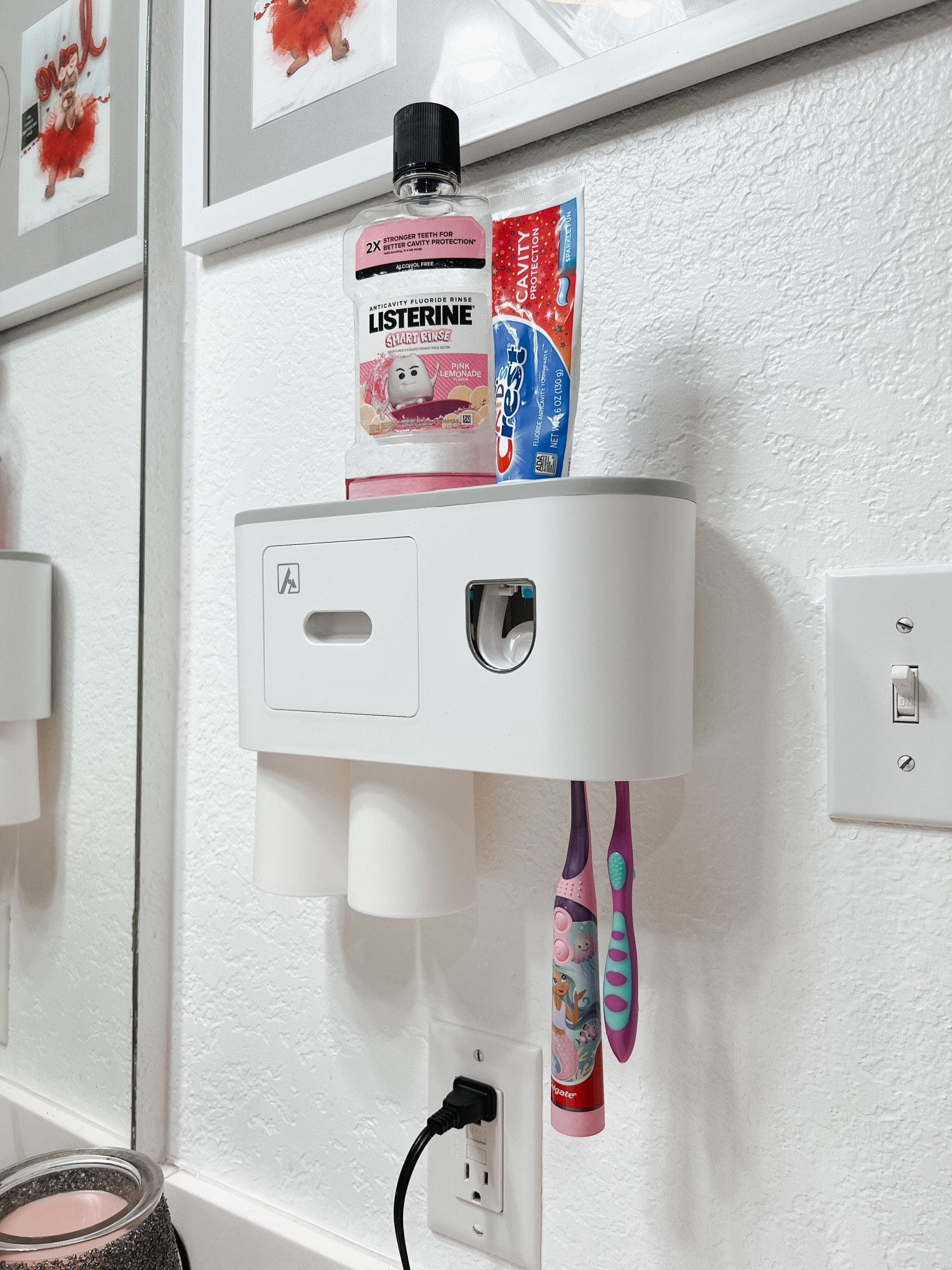 Kids toothbrush organizer 
🚨 mom hack 🚨 
My daughter was always getting toothpaste everywhere! ✨And while
we love an independent gurl ✨  I was TIRED of cleaning it up. This storage system sticks to the wall with a command strip (so no drilling) holds 2 rinse cups upside down so no bacteria 😉 holds 4 toothbrushes, dispenses the toothpaste BEAUTIFULLY, and has two storage compartments to keep your counters clear. 10/10 recommended and I’m getting one for my bathroom. 😏



#bathroomorganization #bathroom #amazonhack #amazon #founditonamazon #amazoninfluencer 

#LTKfamily #LTKkids #LTKFind