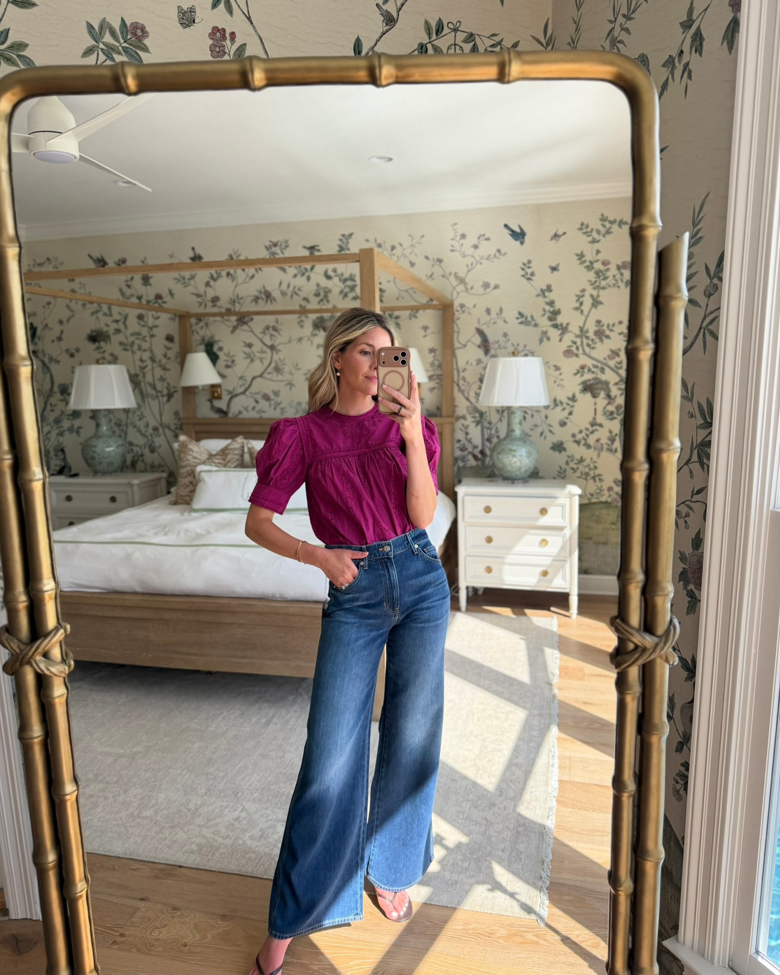 such a good easy fall outfit! i love this jewel tone blouse paired with wide leg denim. the eyelet details + puff sleeves make the top feel special, while the jeans keep the whole look really wearable.

this is exactly the kind of outfit i’d wear for dinner, a casual date night, girls night, or even dressed down with flats for daytime. such an easy way to start leaning into fall color while it’s still warm out.

#LTKSeasonal #LTKootd