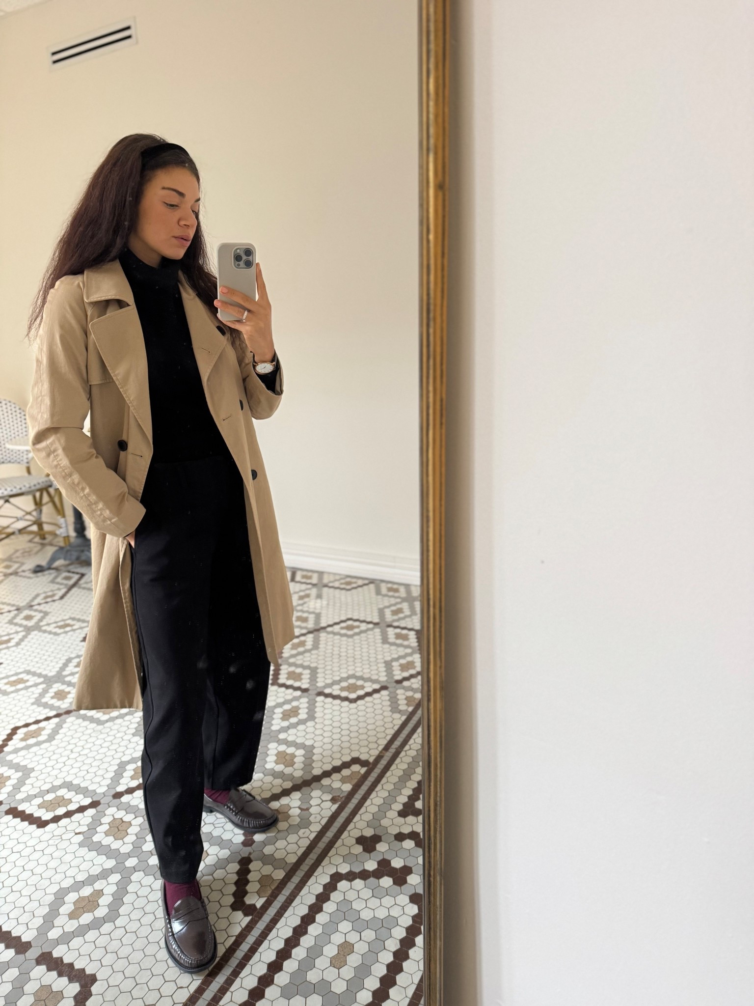 Trench coat outfit with a turtleneck, black pants, burgundy socks, penny loafers, and a leather watch 

#LTKootd #LTKWorkwear