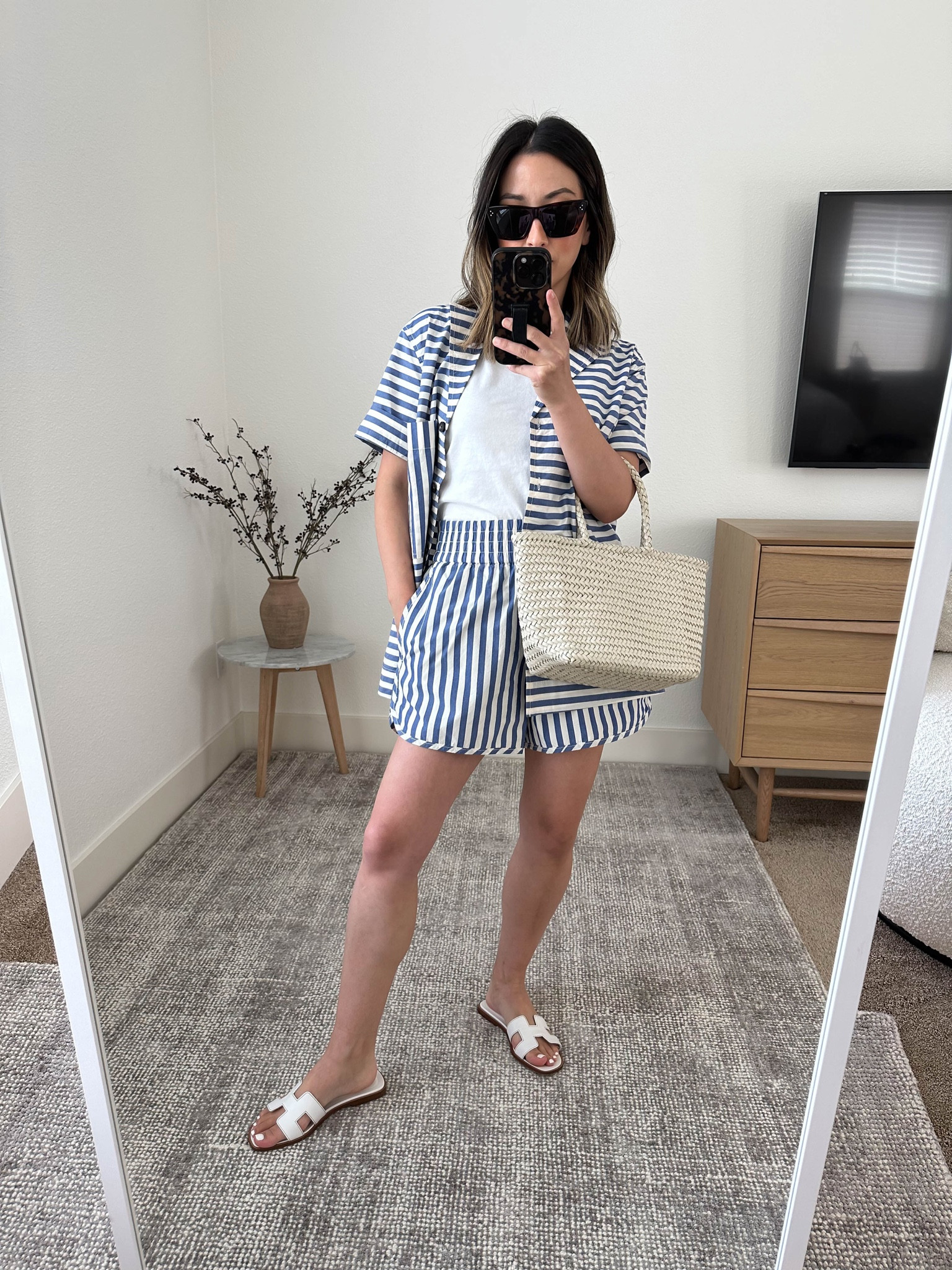 Everlane poplin striped set. Love this one! Can be worn together or separately. 

Everlane poplin camp Shirt xs
Everlane Polin boxer shorts xs
Everlane tank small. Need an xs
Hermes Oran sandals 35
Club Monaco bag (old)
Celine sunglasses 

#LTKitbag #LTKshoecrush #LTKSeasonal