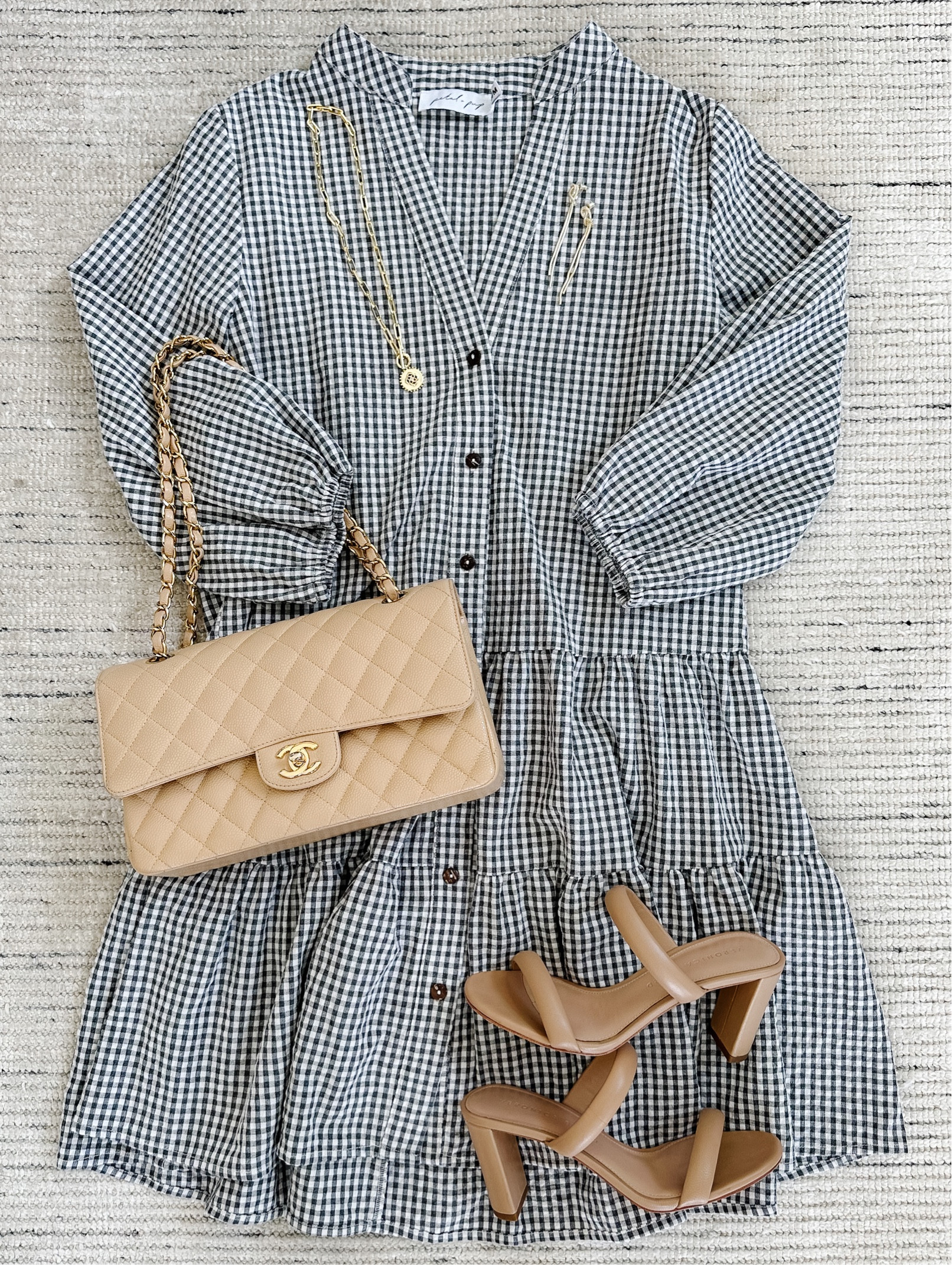 Smart casual summer outfit with gingham mini dress paired with sandals and accessories for a chic look. Love this for dinner, casual workwear, weekend outfit and more! Use HKCUNG20 for 20% off the dress. So flattering on and I love the tiered skirt

#LTKSeasonal #LTKstyletip