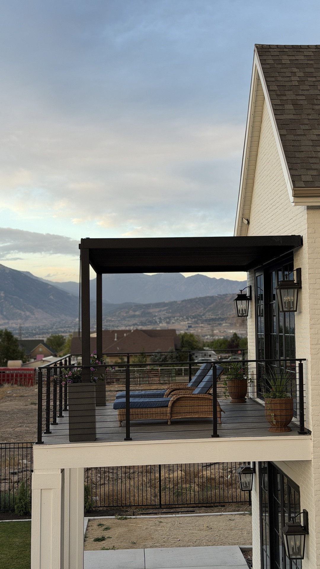 #ad Problem: doors too tall for pergola kits.
Solution: buy one anyways and make the posts TALLER!!
Here’s how I did it, in order 😘

Buy your pergola & planters from @wayfair I’ve linked the one I got as well as a few other sizes  that would work great for this project. 

Follow all of the pergola kit directions, but once the outside square is assembled level the posts and see how tall of a height difference you need to make up. Ours was 7.5 = 1 cinderblock and 3/4” shims. 

Position the planter so you can anchor it down to your deck supports (we used 3” lag bolts + a dab of silicone to waterproof the hole). 

Drill the posts INTO the cinderblock.

Double check level and plumb THEN add dry concrete mix into the planter and spray it with water (dry pour method). *double check your load capacity. We only filled 1/3 of the planter with concrete so it wasn’t TOO heavy for the deck. 

Then topped it with gravel and soil. 

Continue with the rest of the instructions, and that’s it!! 

#wayfairpartner #wayfair @wayfair