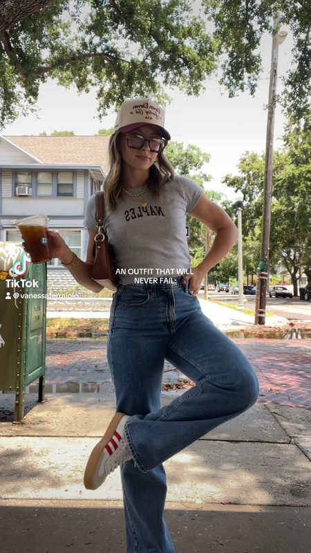5/14/24 Casual basic outfit inspo 🫶🏼 Abercrombie jeans, Abercrombie loose jeans, loose jeans outfit, loose jeans, medium wash denim, trucker hat, trucker hat outfit, casual summer outfits, casual summer fashion, denim jeans outfit, Adidas sambae sneakers, red Adidas sneakers, Adidas sneakers outfit