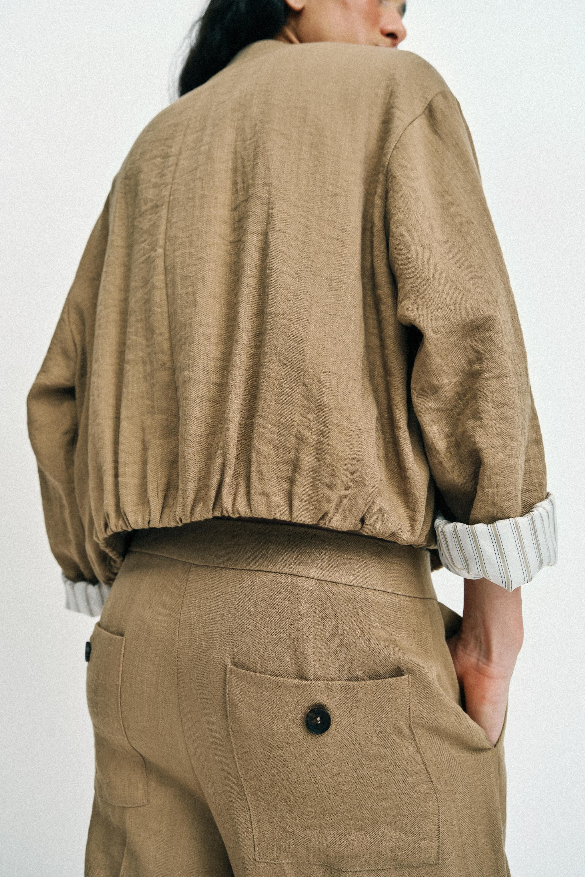 Collared jacket with short sleeves and a combined lining. Featuring front patch pockets with flap... | Zara UK