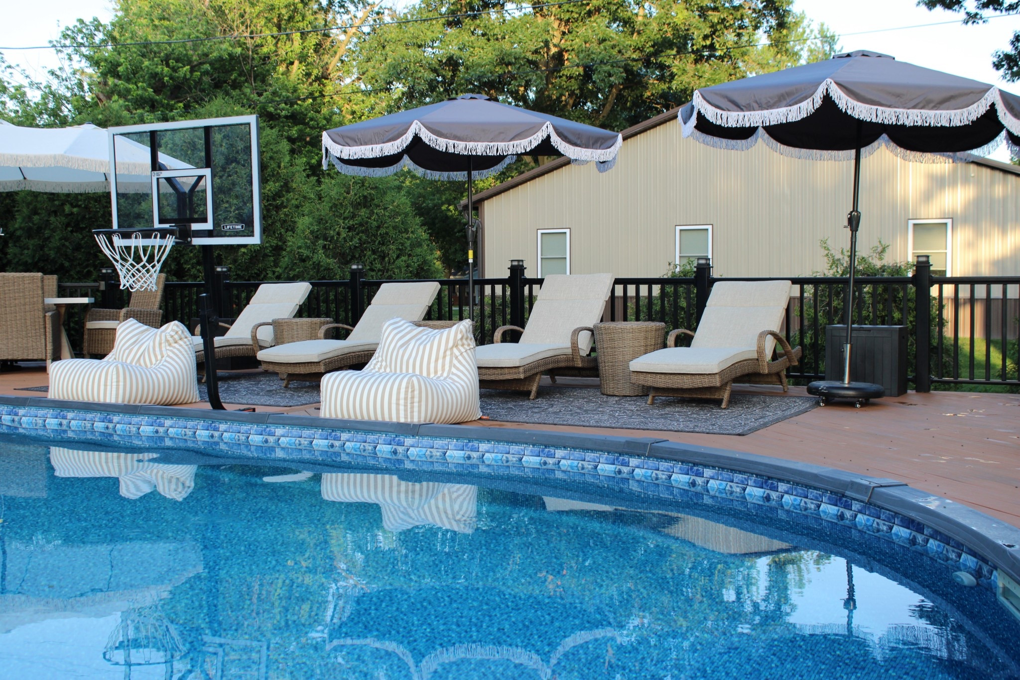 Above Ground Pool Deck Inspiration

Deck Mounted Basketball Hoop | Tanning Chair | Chaise Lounge | Wicker Furniture | Taupe Striped Outdoor Bean Bag Chair | Dark Gray Fringe Tilt Umbrella | Umbrella Stand | Rattan Outdoor Table | Accent Table | Black Waterproof Outdoor Rug | Neutral Outdoor Cushions | Beige 

#LTKHome #LTKSeasonal