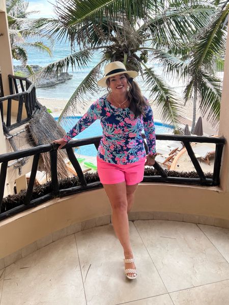 Lilly and tropical go hand in hand🏝️🏝️🏝️. I love the vibrant long sleeve tunic! It kept me warm after a down pour! My favorite hst has built in SPF from
Amazon. 

#LTKtravel #LTKSeasonal #LTKstyletip