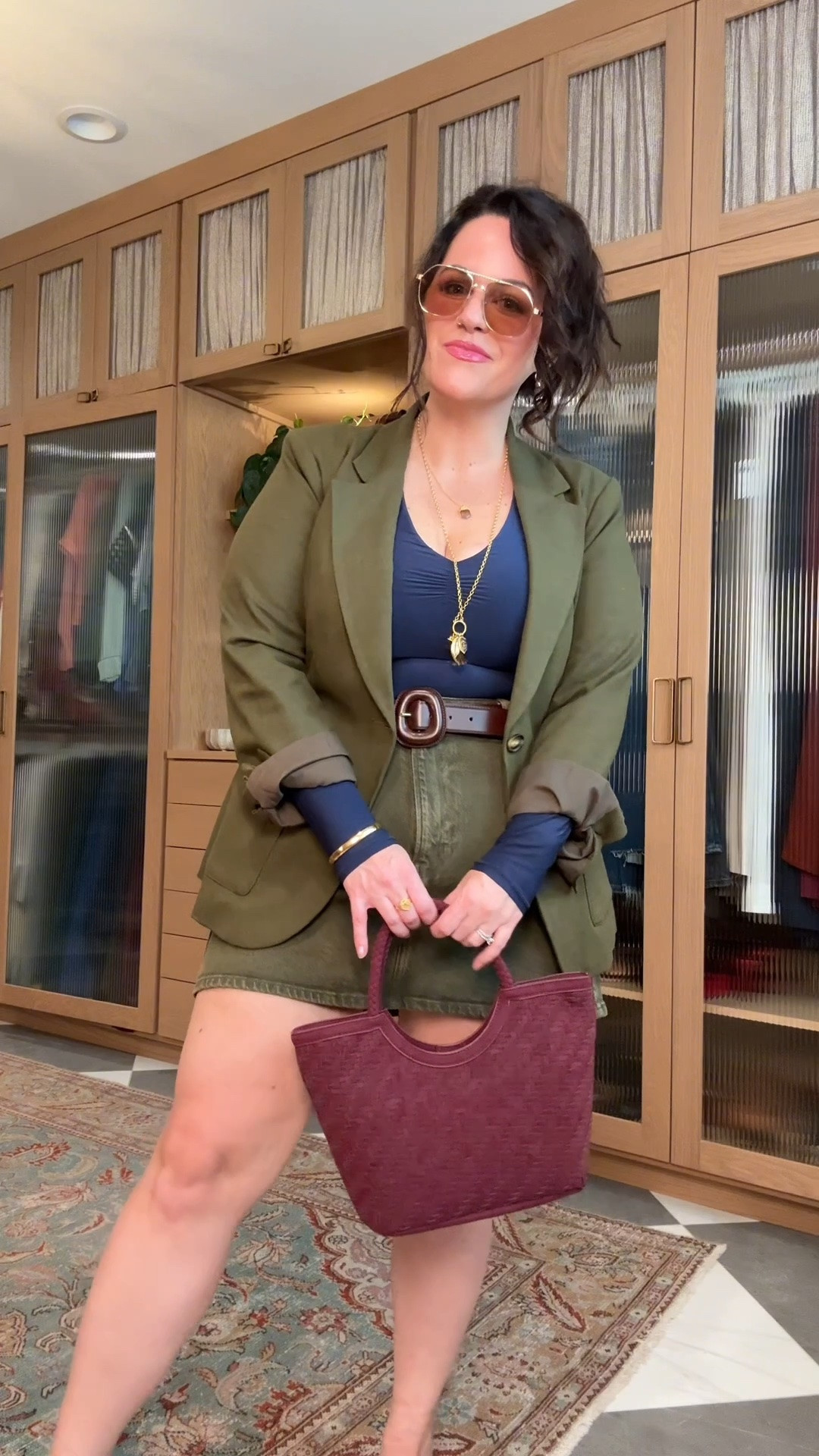 midsize affordable fall transition outfit 
code: TRULY for 15% off @Satya Jewelry

navy long sleeve top: large 
olive blazer: large
olive denim skirt: size 14
blue mary jane rothy’s, arch support and comfy for being on your feet all day at work. true to size 
target woven bag

#LTKOver40 #LTKMidsize #LTKootd