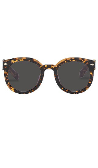 Karen Walker Super Wavy Duper in Brown. | Revolve Clothing (Global)