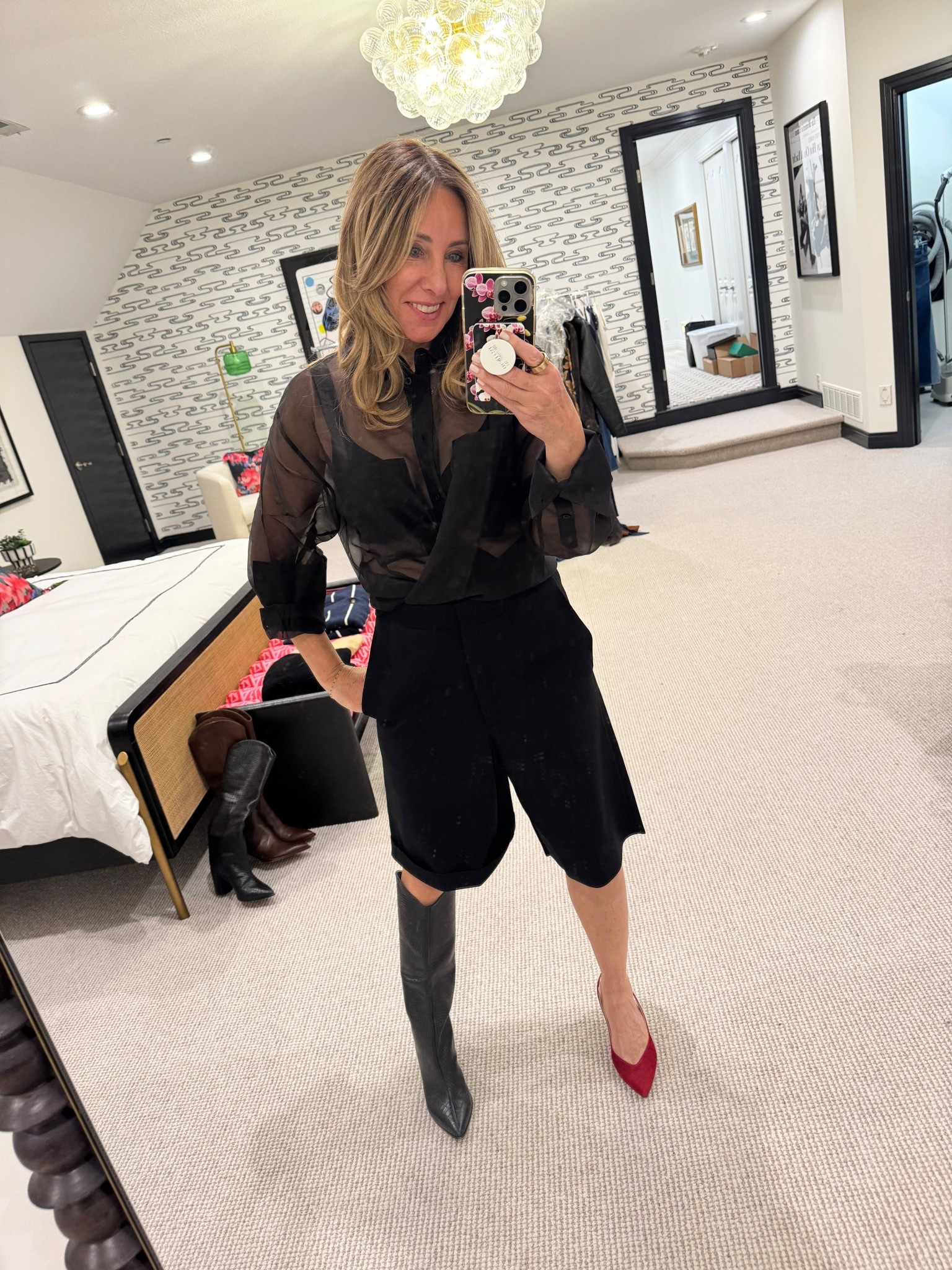 I was doing some outfit planning and trying to decide if I like this with boots or a sling back better. I actually like both. I’ve been very into longer shorts lately. Playing around with how to wear them, so it feels like me. Tell me which one you like best. By the way, these pumps are the most comfortable thing I’ve ever worn my favorite brand and I have a savings code. Use code HALLIE15 for 15% off!