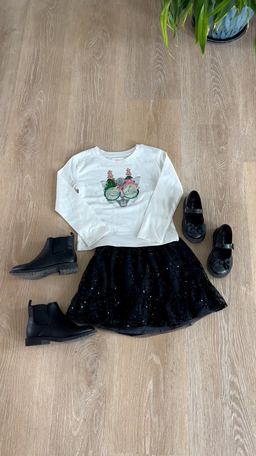 Girls' Long Sleeve Christmas Cat Flip Sequin T-Shirt 😻🎅 Paired with a black sequin skirt and either black Chelsea boots or Mary Jane bow shoes — it’s the purr-fect holiday look! Sparkly, comfy, and ready for every festive photo moment. 🎁❤️
#LTKKids #HolidayStyle #KidsFashion #ChristmasOutfit #FestiveStyle #GirlsOutfit #MiniStyle #ToddlerFashion #LTKHoliday #HolidayReady #KidsWardrobe #ChristmasStyle #SequinTop #LTKFamily

#LTKFindsUnder50 #LTKSeasonal #LTKKids