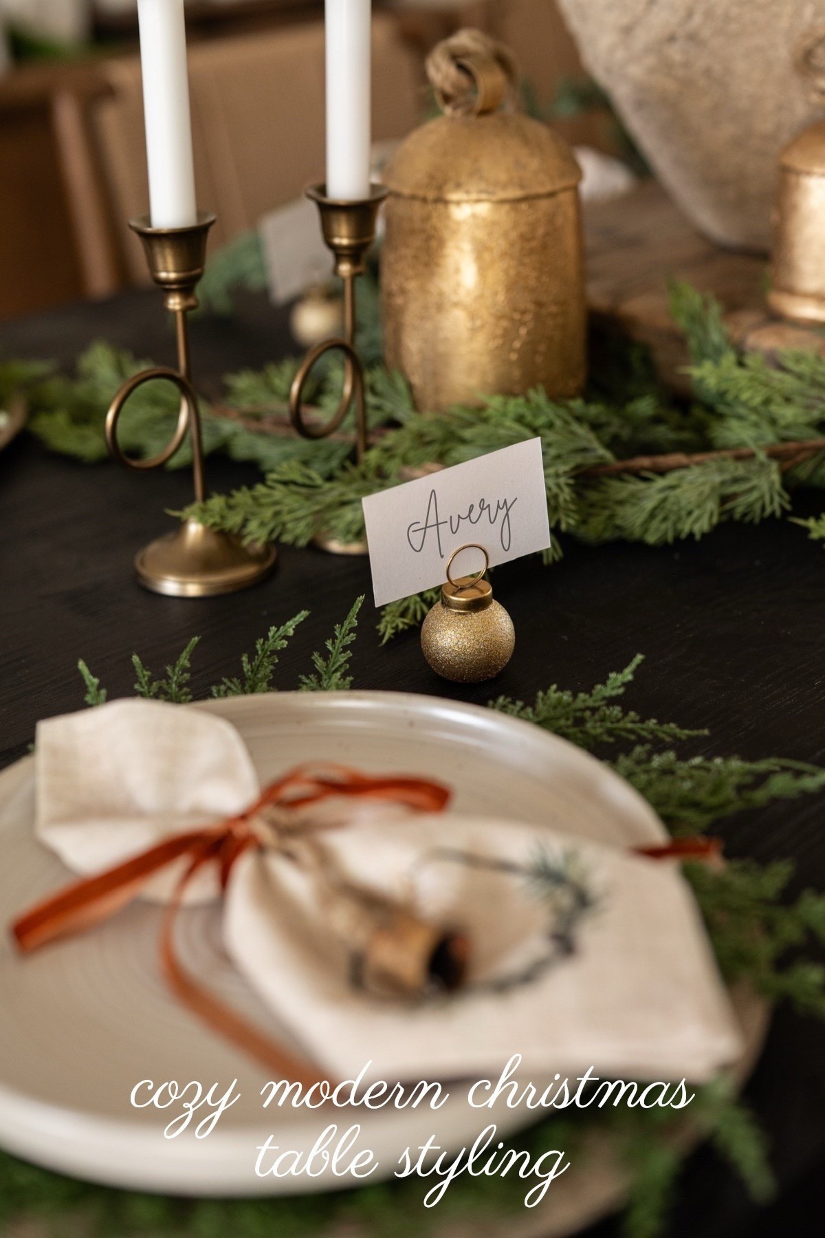🌿 Ready to impress your guests the moment they sit down?
This table features natural greenery layered under each plate, hand-tied linen napkins, velvet ribbon, hammered brass bells, gold ornament place card holders, and twinkling holiday lights in the background — a cozy, beautifully curated Modern Classic tablescape.

#porcheandco #holidayplacecards #modernholidaytable #greenerytablescape #linenandvelvetdecor #brassbellholiday #evergreentabledecor #christmasdinnerparty #holidaystylingideas #neutralchristmasdecor

Do you want to bring our dreamy Modern Classic style interior design into your own home? 🏡 You’re in luck! Reserve our Online Interior Design packages today -> https://porcheandco.com/edesign ✨ We can’t wait to work with you & design your home with #porcheandco



#LTKHoliday #LTKHome #LTKSeasonal