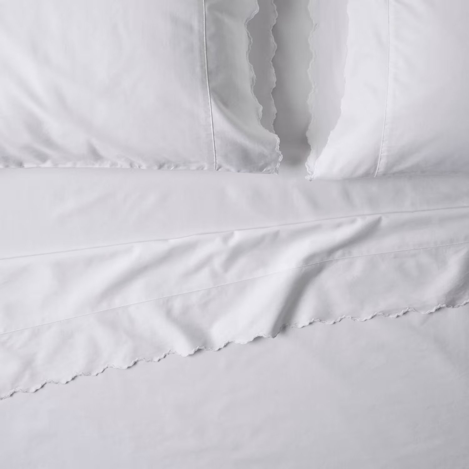 Optic White Scalloped Edge Sheet Set | Magnolia
