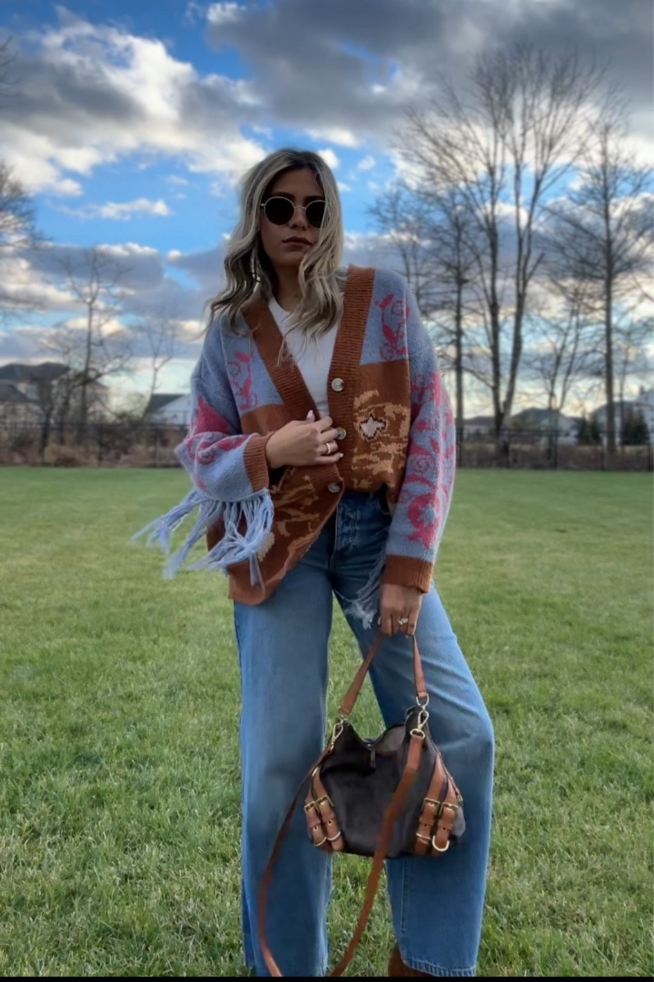 This boho sweater from Nasty Gal is so cute 💙 wearing a size small. Jeans run small so size up. 

#LTKU #LTKstyletip #LTKfindsunder50