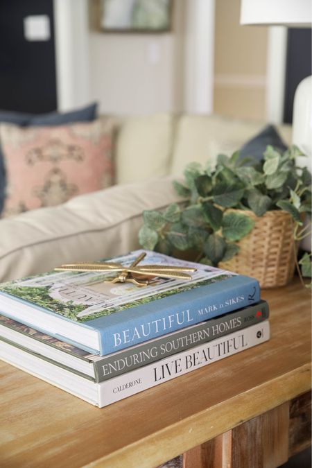 And over the past few years I’ve added new coffee table books to my collection here and there. I’ll ask for them for holidays or my birthday or treat myself to a selection when I find one I love. 

Dragonfly decor, faux plants, console table

#LTKunder100 #LTKhome #LTKstyletip