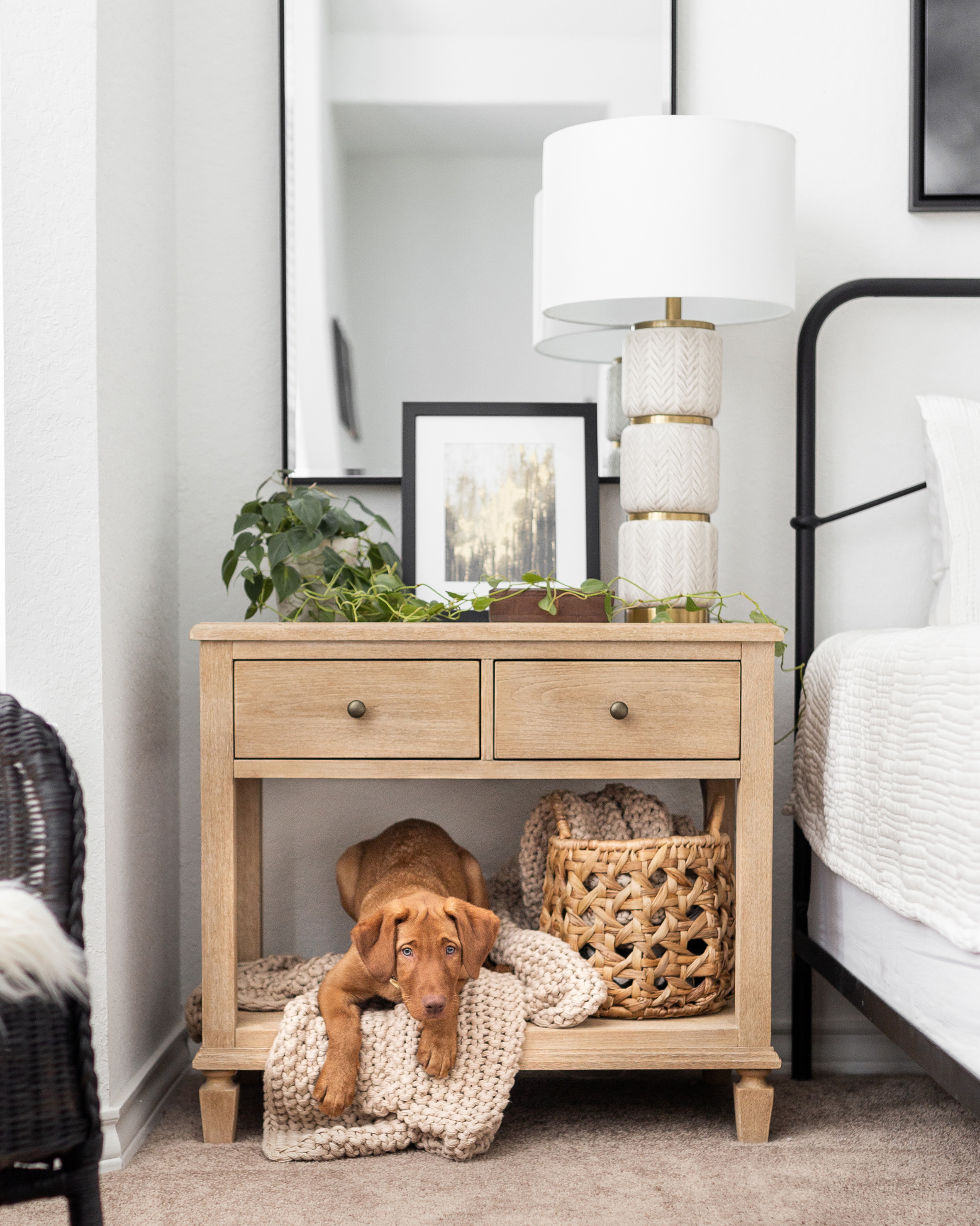 A well-styled nightstand can make a bedroom feel so much more inviting! I love mixing practical pieces with a few cozy accents like a timeless lamp, framed artwork, trailing greenery, and a woven basket for added texture.

This chunky knit throw blanket is currently on sale, making it the perfect time to add an extra layer of warmth to your bedroom. I'm sharing everything from this cozy corner below.

#LTKHome #LTKSaleAlert