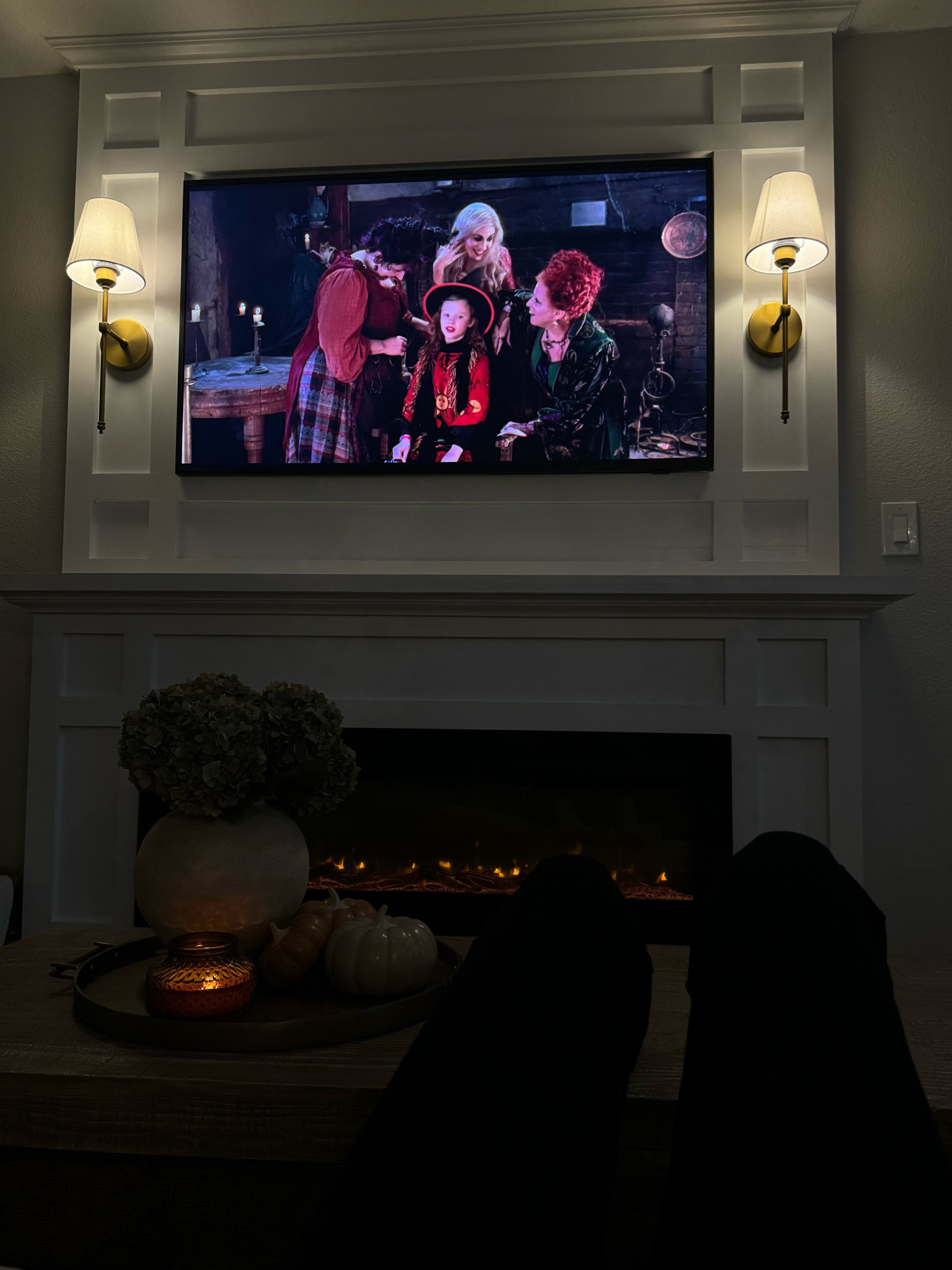 Fall movie night 

Pottery barn coffee table decor | Samsung frame tv | Amazon wired sconces | fireplace decor | Halloween | home decor | autumn 

#LTKSeasonal #LTKHome