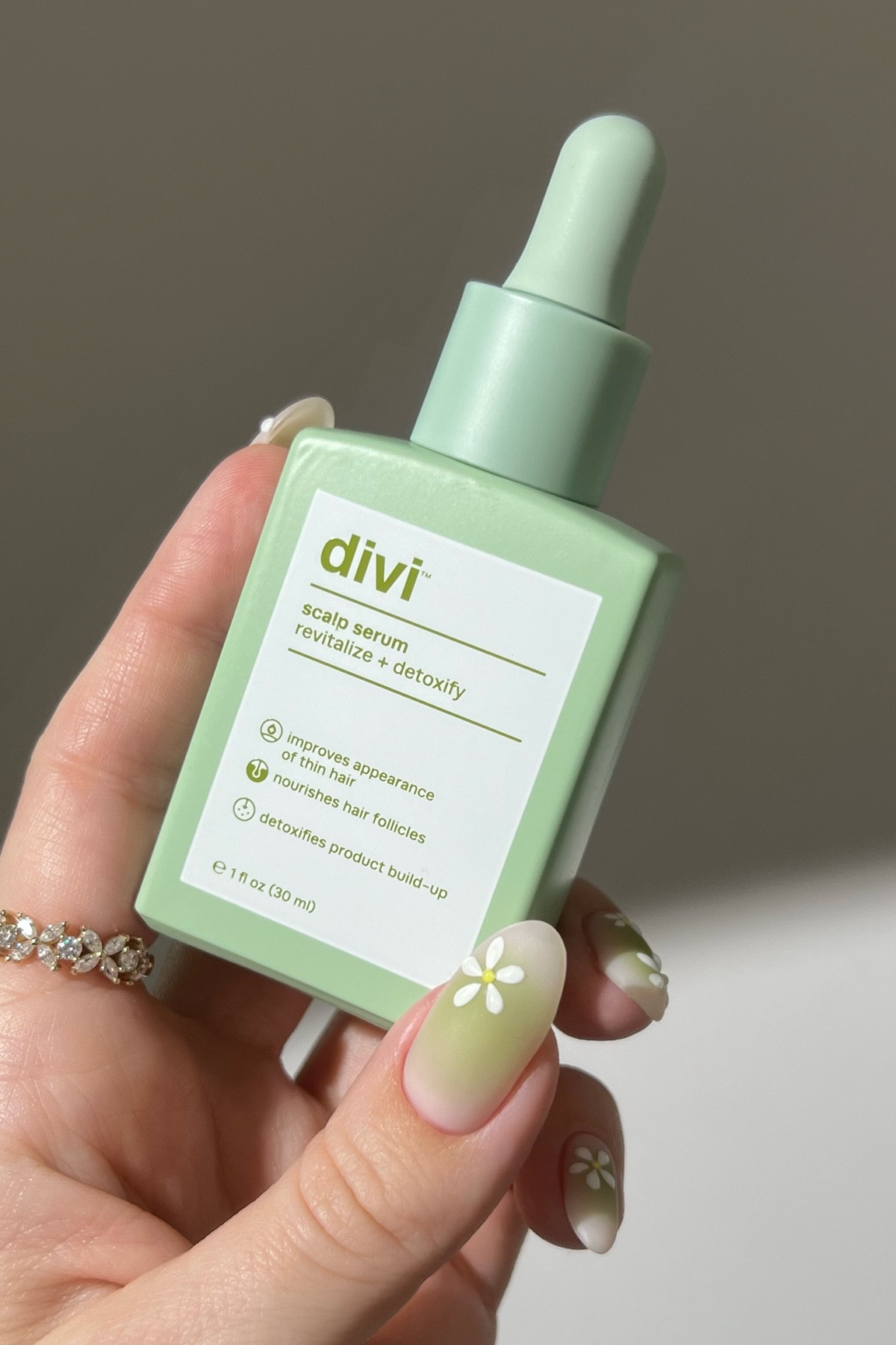 🧚🏻🍃 I’ve been using @diviofficial scalp serum for the past month, and I have to say I’m really impressed with it.

I almost instantly noticed a decrease in hair loss. I barely lose any hair when I wash it. I haven’t noticed my hair getting fuller yet, but I guess I would need to use it a little longer to see more improvement. 

What I also really love about this scalp serum is the fresh minty scent, non-greasy consistency, and how clean and hydrated my scalp feels. Highly recommend. 🌿

Do you have a favorite hair serum?

*gifted #haircare #hairgrowth #scalpcare #scalpserum #hairgoals #hairproducts 

#LTKBeauty #LTKU