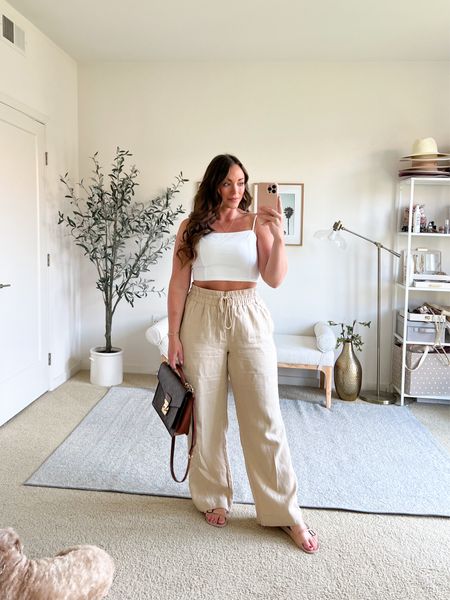 Linen pants and an easy throw on top for a simple outfit❤️ Linen is absorbent and dries quickly! Super breathable!

Wearing a large in pants, top is a medium 

#LTKstyletip #LTKfindsunder100 #LTKmidsize