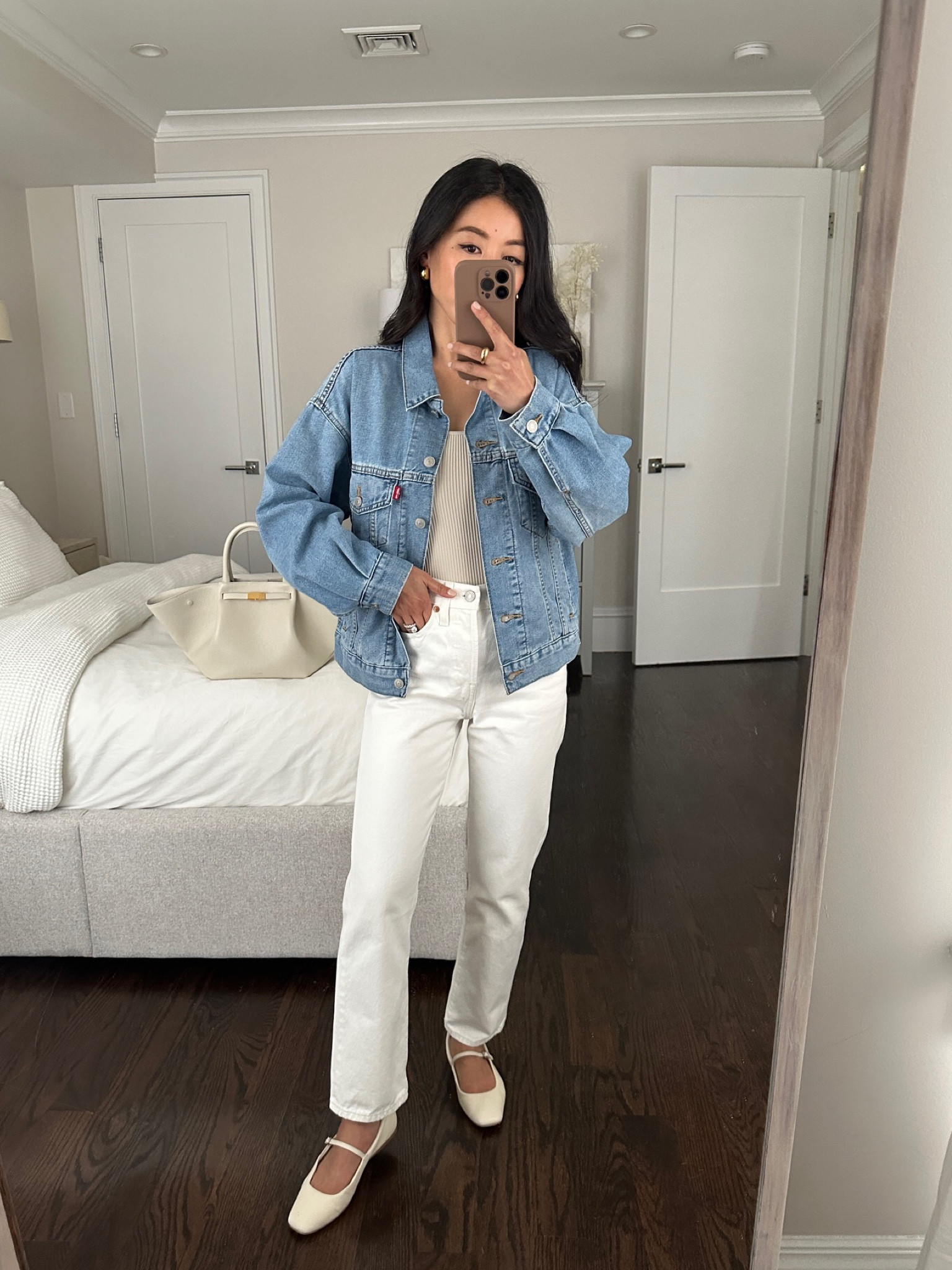 Levi’s spring denim looks 

• 90s trucker jacket in “magic beans” medium wash xxs - I also tried the wash “worn in indigo” size X. for the same cut and it’s very similar with just a small difference between the two colors and sizes. 

Compared to their original denim trucker jacket this is a slouchier more relaxed oversized fit, very on trend and effortless feeling, the material has tencel in the blend and drapes and is soft for denim vs stiff

• Levi’s wedgie straight jeans 24 x 26 - fits TTS and available in 2 inseam options. If you’re new to Levi’s jeans, this one is their most versatile style imo that’s easiest to pair with all kinds of footwear. 

I own the same jeans in "space to think" medium wash and "fully baked" light wash too

Also linked my other favorite, the ribcage jeans! I take size 24 x 27 and they work well on me with flats or sneakers 

• Aritzia tank xxs

• Dolce Vita flats 5.5 - linked target dupes as well 

• Demellier bag 

@Levis #LevisLTKPartner #Levis
#petite spring denim 

#LTKsalealert #LTKSeasonal