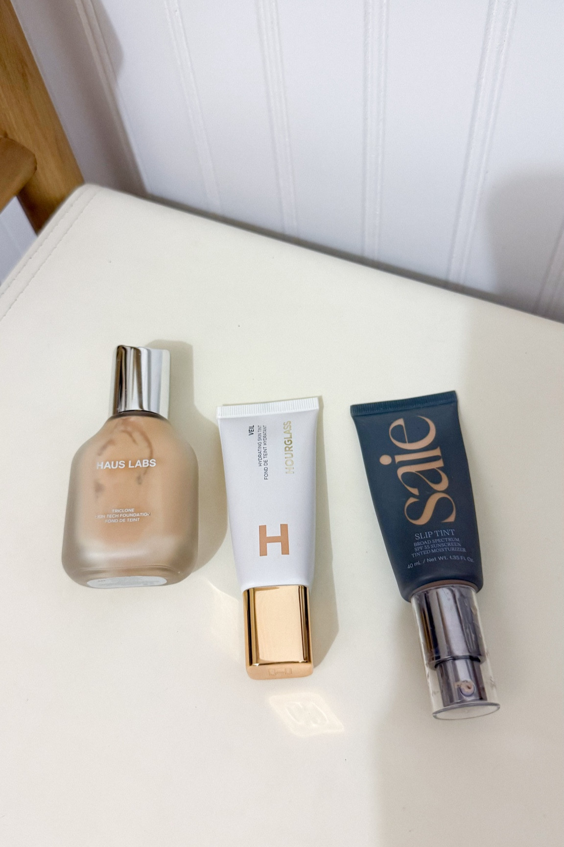 top three skin tints and foundations 
favorite from left to right 
haus labs shade A24, hourglass shade 5, saie shade three 

make up, beauty favorites, make up favorites, skin tint, concealer, foundation
make up haul
#foundation #skintint #lightweight #fullcoverage #makeup #beuaty #favbeautyproducts #favoritemakeup #favoritebeautyproducts 

#LTKFindsUnder50 #LTKBeauty #LTKGiftGuide