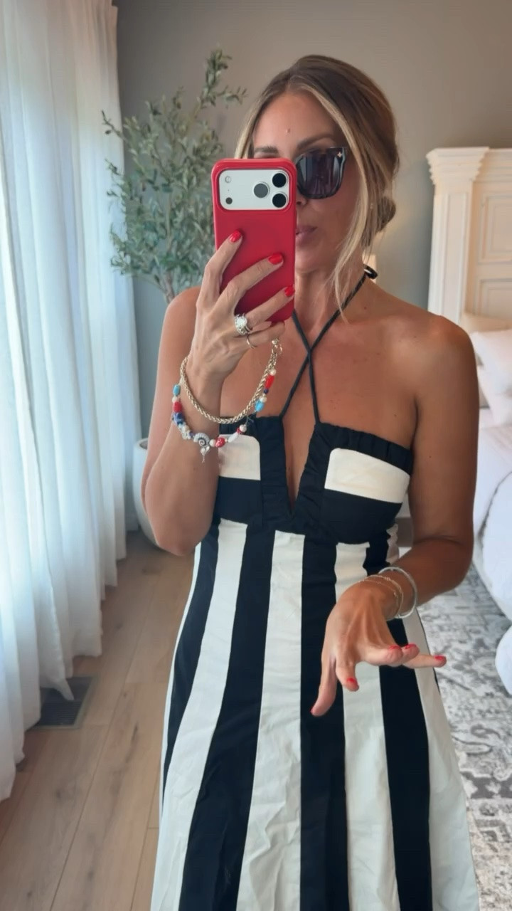 I’ve been reaching for this striped midi dress a lot lately. The breezy fabric and flattering cut make it feel effortlessly polished while keeping it comfortable all day. If you want a go-to dress that works for brunch, errands, or a casual summer outing, this one is definitely worth adding to your wardrobe.

striped midi dress, summer dress, casual summer outfit, halter neckline, flattering summer look, everyday summer style, breezy dress, versatile summer dress, chic summer outfit, minimal accessory outfit, themominstyle

#LTKootd #LTKSeasonal #LTKTravel