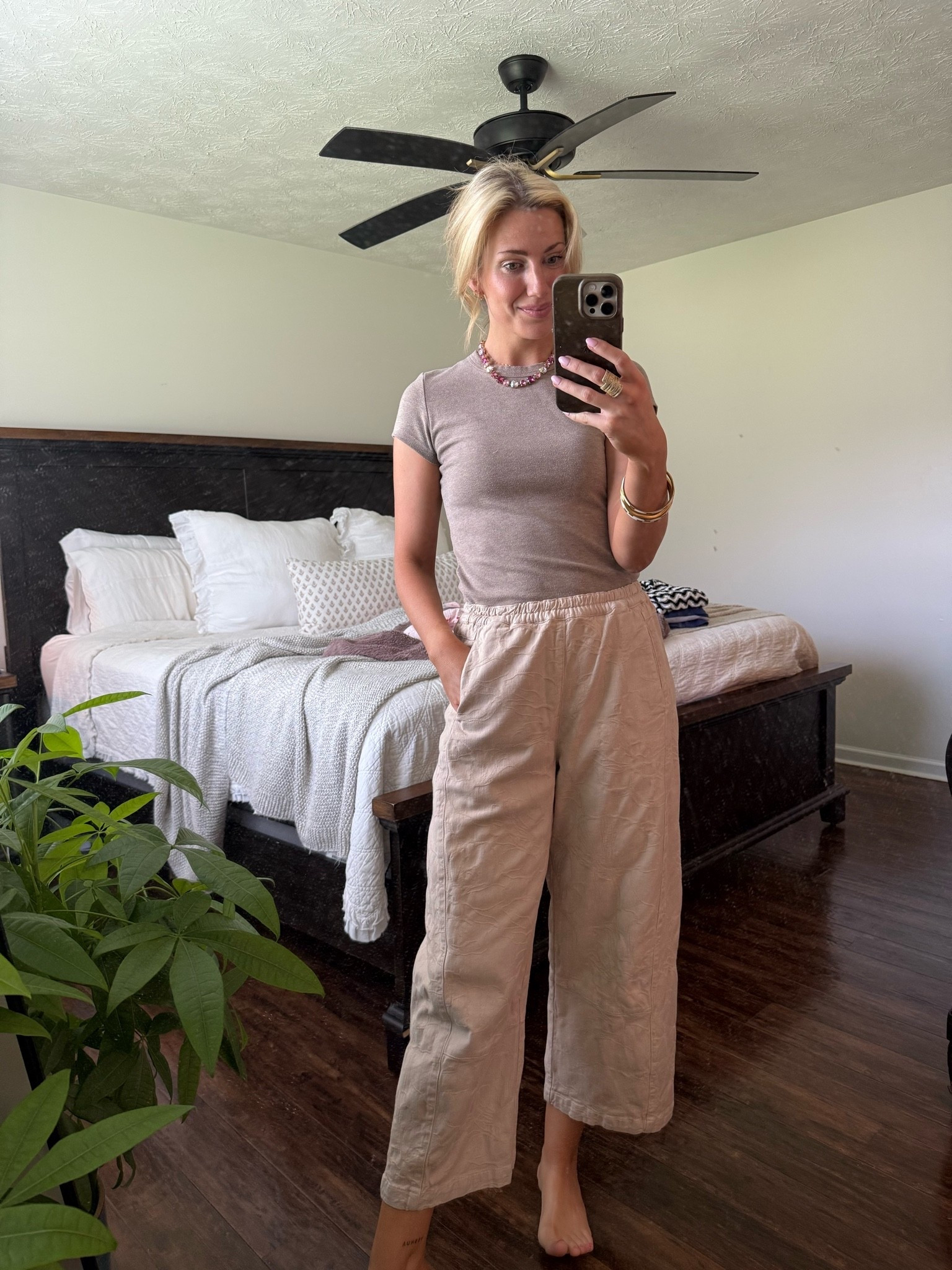 small in the pants, medium in top. 
no drawstring but elastic!