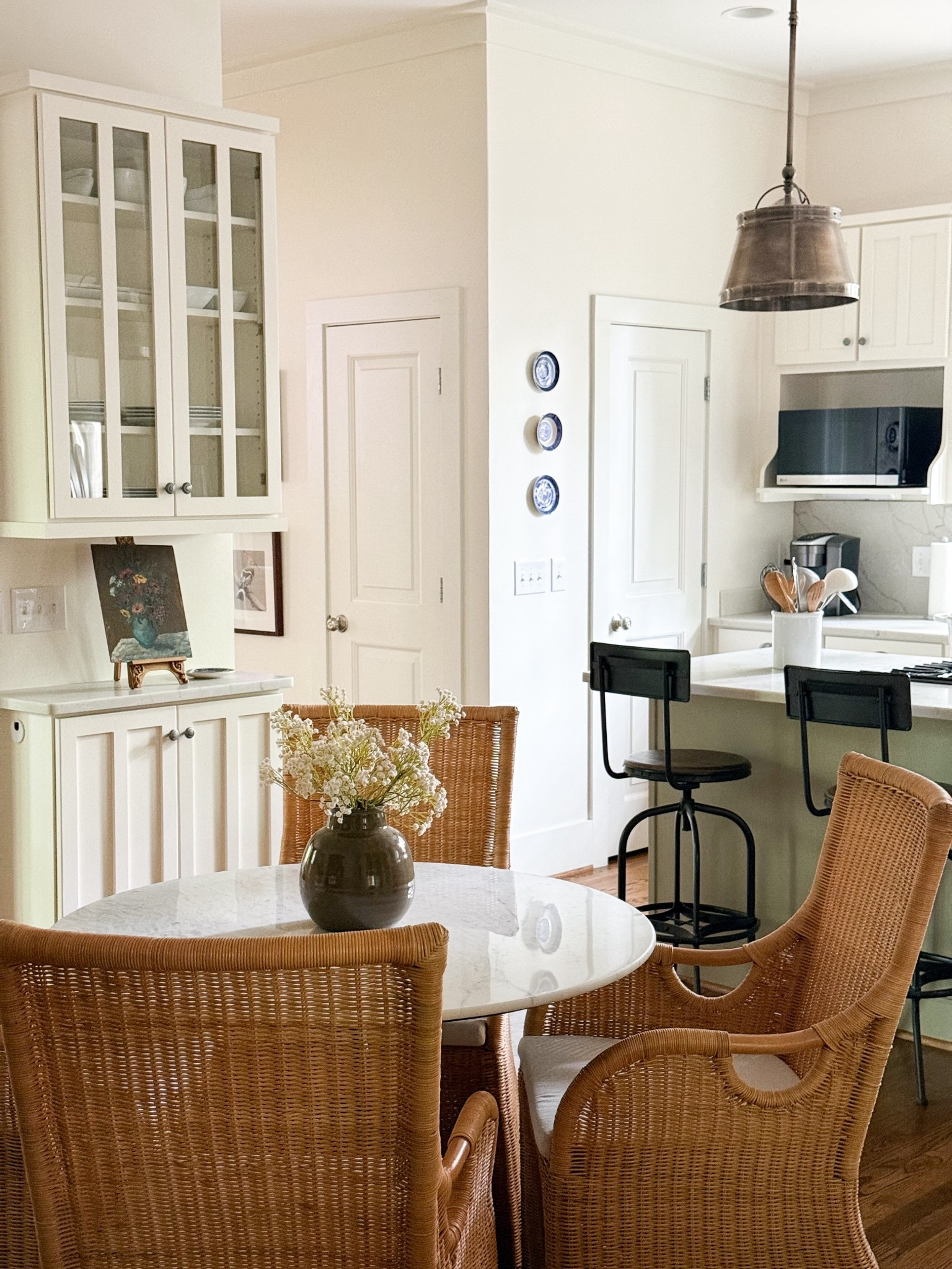 Kitchen table, bistro table, dining chairs, rattan dining chair, kitchen pendant light 

#LTKHome