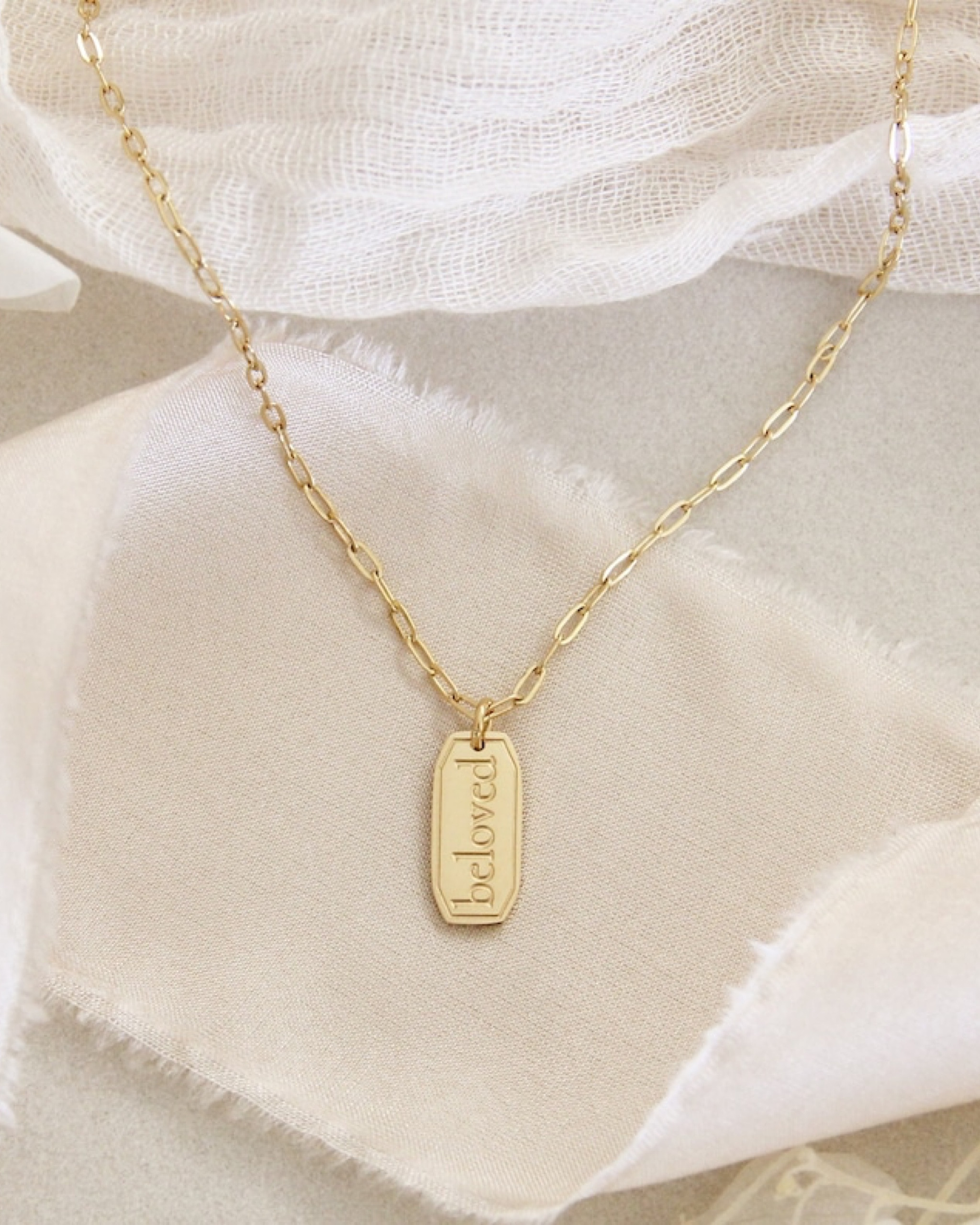 Faith-Inspired Jewelry - grad gift for her. 
Simple cross or “beloved” charm necklaces—subtle, pretty, and personal.

#LTKFindsUnder50 #LTKBeauty #LTKGiftGuide