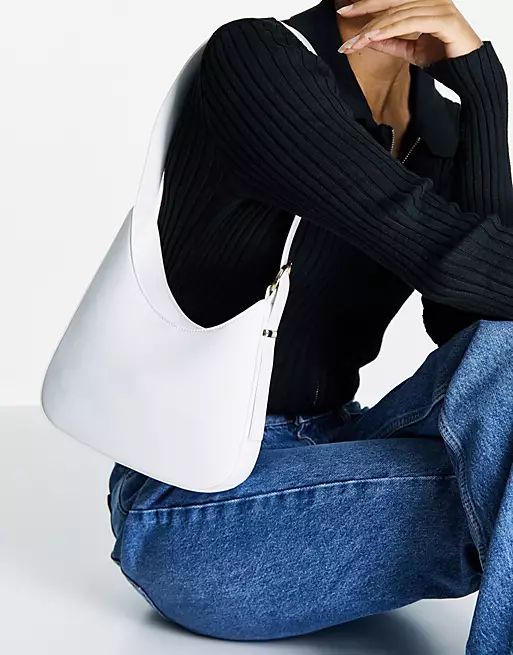 ASOS DESIGN angled shoulder bag with buckle in white | ASOS (Global)