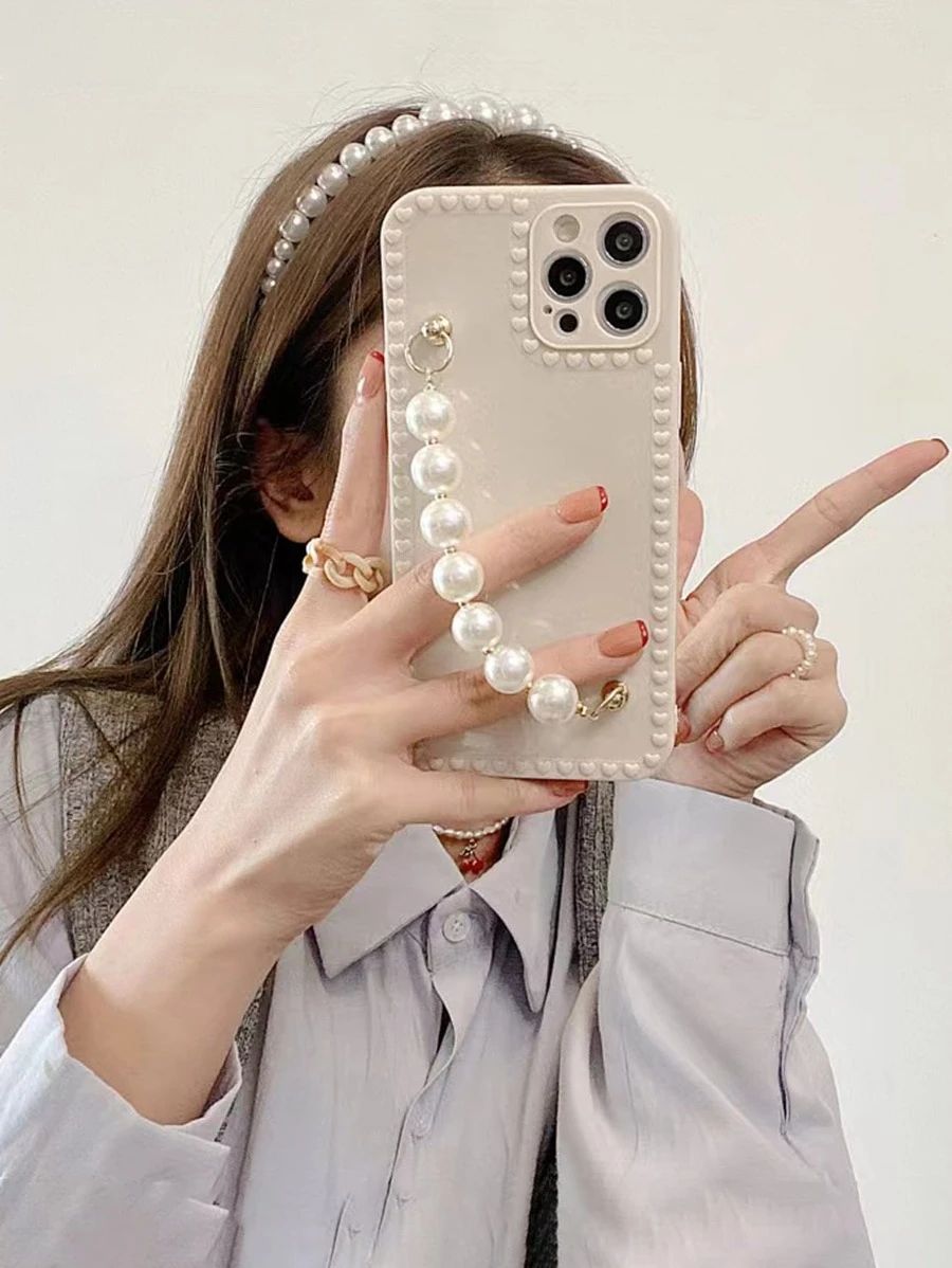 Faux Pearl Handstrap Phone Case SKU: se2202111041691440(100+ Reviews)$2.00Make 4 payments of $0.5... | SHEIN