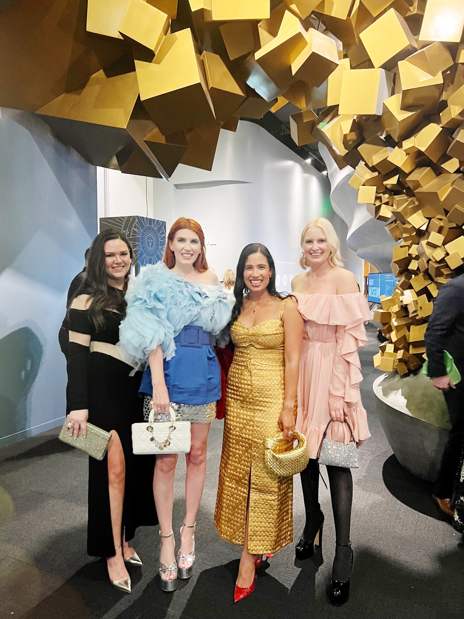 Last night with some of my friends at the Perot Museum gala.
I tucked this midi skirt under and pinned it and layered my silver metallic mini underneath. 

#LTKSeasonal #LTKwedding #LTKHoliday
