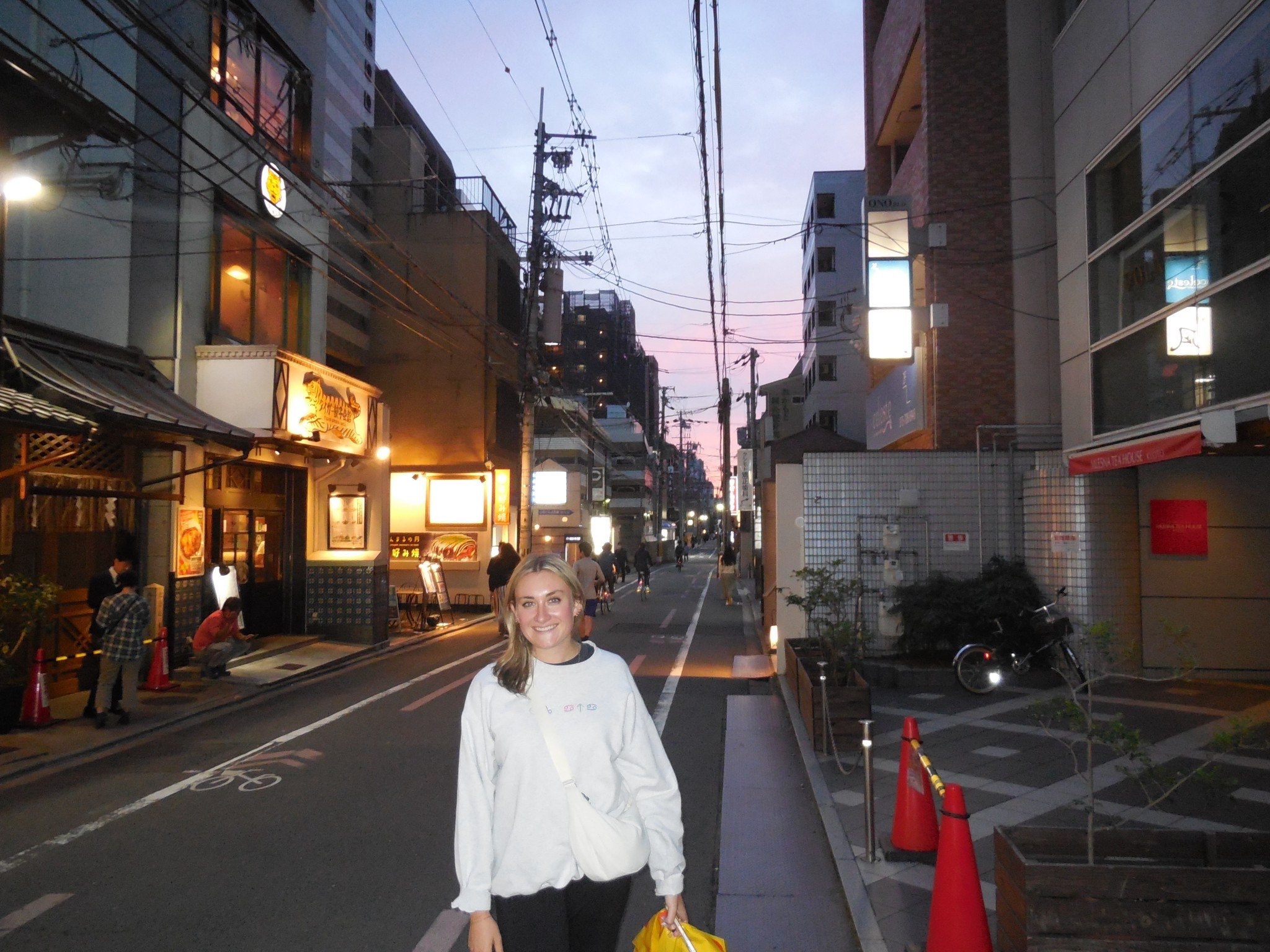 Sunset style in Kyoto! This is a perfect spring or fall look to keep you cozy but stylish. In Japan, work pants are the IT item. Here, I’m wearing my favorite J.Crew work pants that feel just like cozy sweats. I paired them with a short sleeve navy tee, and of course my big three sweatshirt that I live in. Along with my Uniqlo bags and Onitsuka Tigers, I was ready to take on the town. 

#LTKTravel #LTKStyleTip #LTKItBag