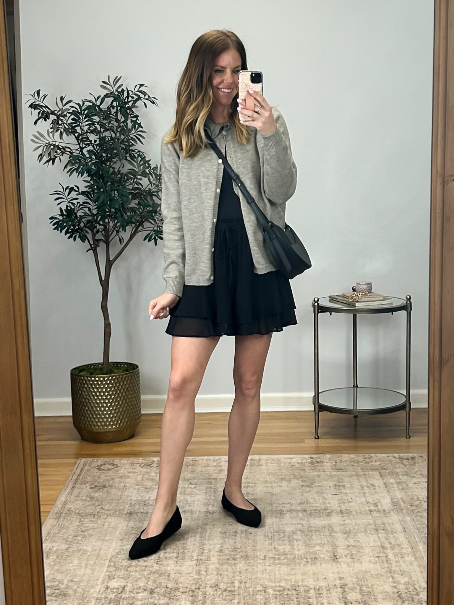 Cute spring outfit. Love the shorts that look like a skirt and this little cardigan is so cute with the ruffle collar  

#LTKFindsUnder50 #LTKStyleTip #LTKSeasonal