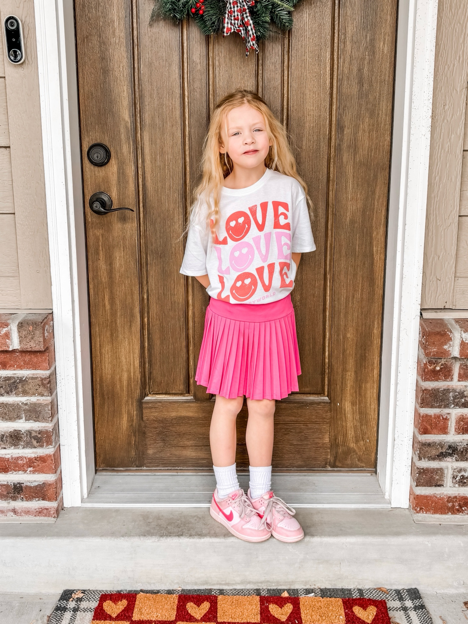 Her valentines outfit was SO GOOD and I’m sooo happy I found something she can wear all spring and summer long! The tee is SOFT and would be cute with leggings/bike shorts and the skort has built in shorts under and comes in the best colors! These exact Nikes are gone but linking similar and the best/best PRICED pack of kid socks ever!

#LTKfamily #LTKSpringSale #LTKkids