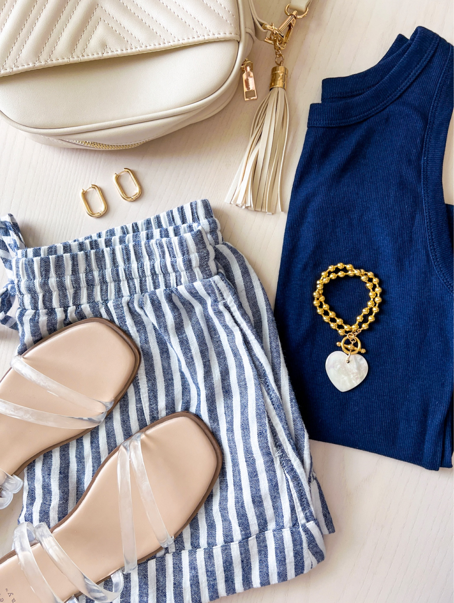 Summer outfit 

Tank top true to size - I have size small

Shorts comfy and true to size - little large (if between sizes go with smaller size) I have in XS

Sandals run large - I sized down 1/2 size 

Purse has adjustable strap & comes in other colors 

Gold earrings 

Statement heart bracelet 





Summer outfit , shorts , tank top , sandals , gold jewelry, summer style , vacation outfit , casual style , #ltkitbag #ltkstyletip #ltksalealert

#LTKSeasonal #LTKshoecrush #LTKunder50